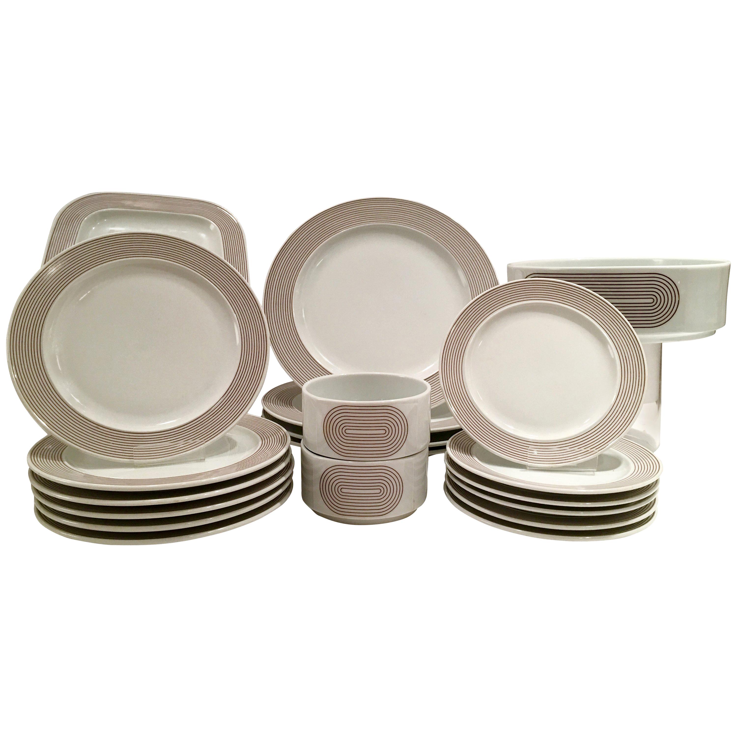 1970s Modern German porcelain dinnerware ‘Joy One’ set of 20 by, Rosenthal. Pattern features a modern and clean lined white ground with brown rings/stripes detail.
Set includes, 4 dinner plates, 10.5 diameter, 6 bread/butter plates, 6.50
