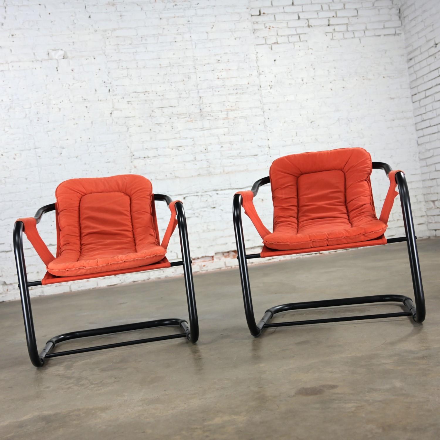 1970’s Modern Orange & Black Tube Cantilever Sling Lounge Chairs Jerry Johnson S In Good Condition For Sale In Topeka, KS