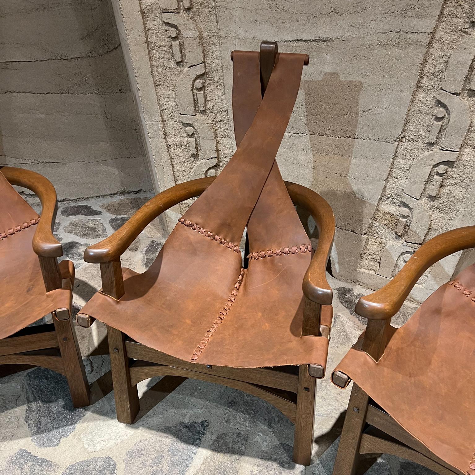 Late 20th Century 1970s Modern Safari Lounge Set Three Leather Sling Chairs Wood Tripod Leg Base For Sale