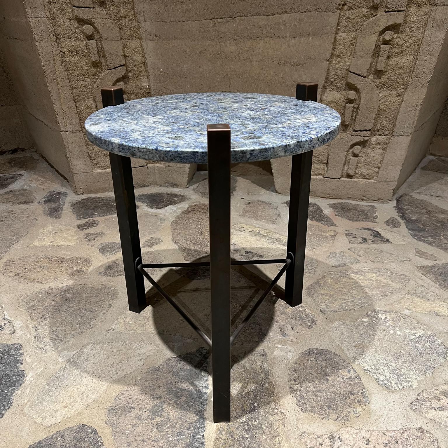 1970s Side Table luscious blue marble granite on a richly patinated bronze frame 
Modern design clean lines 
Solid bronze frame with a round stone top.
No label. In the style of artist and designer Cedric Hartman.
Measures: 18.5 diameter x 21.5