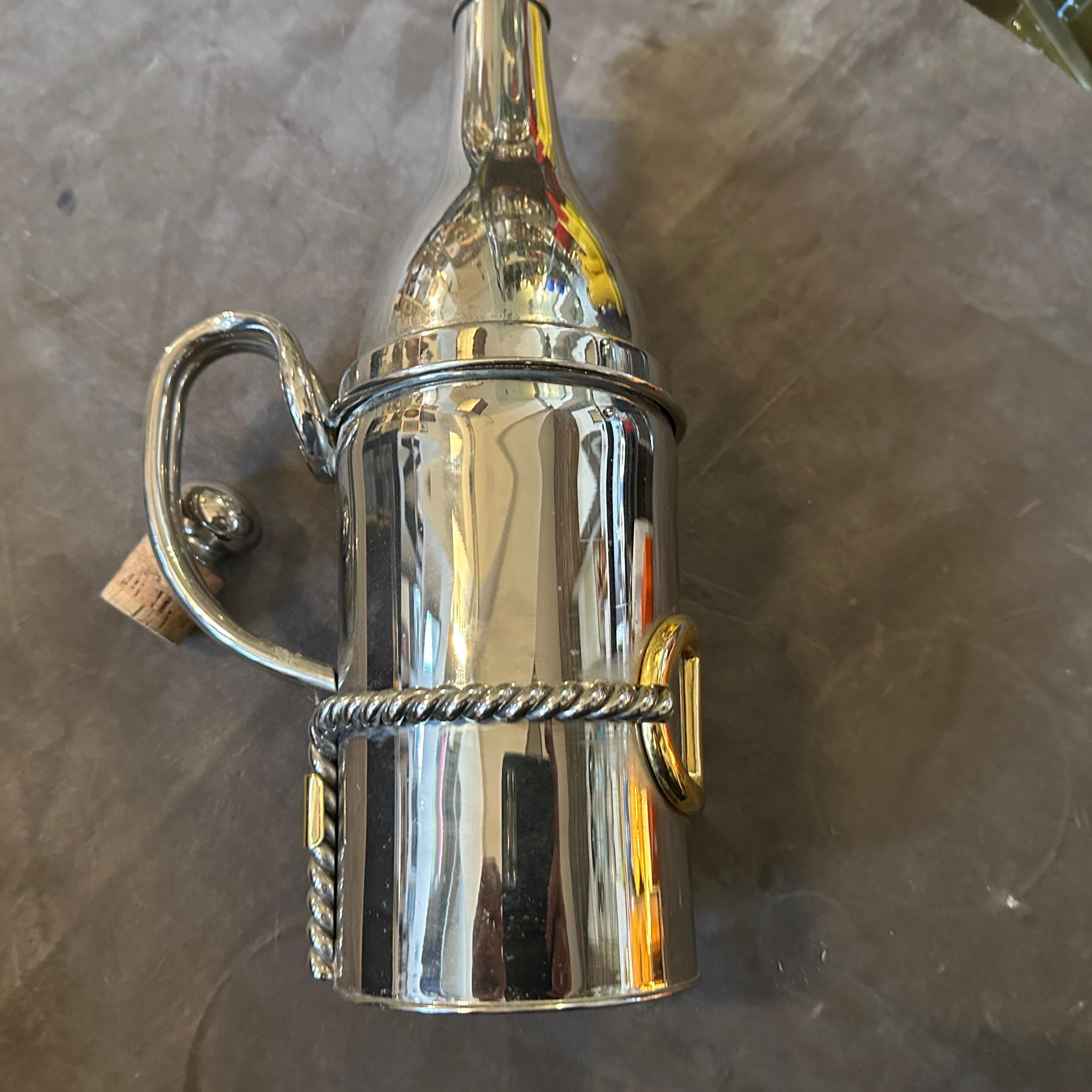 Italian 1970s Modern Silver Plate and Brass Accents Bottle by Gucci Firenze For Sale