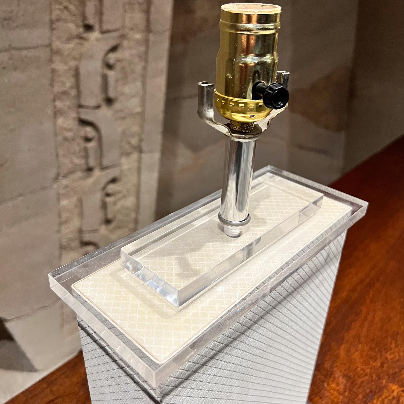 1970s Lucite Modern Table Lamp
In the style of Charles Hollis Jones
Unmarked
17.5 h x 9.25 w x 4.5
Preowned vintage condition
Does not include a lamp shade
Refer to listed images