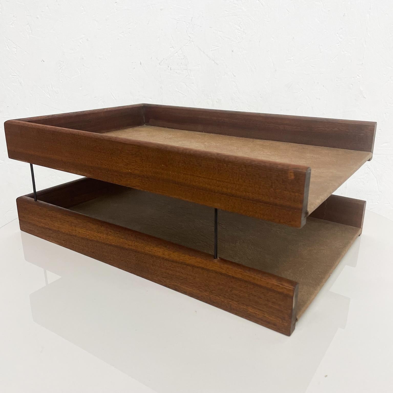 Desk tray
Midcentury modern office tray with two tiers. Walnut and bronze with faux leather cover.
No label. USA circa 1970s
Solid beautifully grained walnut wood
Sturdy construction with two levels supported by metal rods.
Measures: 15.75