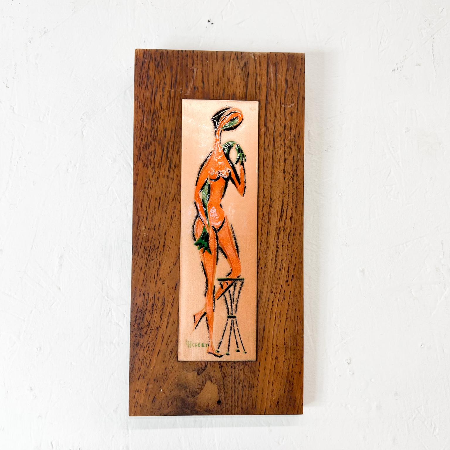 1970s Modernist vintage enamel art female nude on walnut wood.
Signed artwork signature appears as: L H Cecet
Measures: 5.63 wide x 14 tall x .75
Original unrestored vintage condition.
Refer to images.