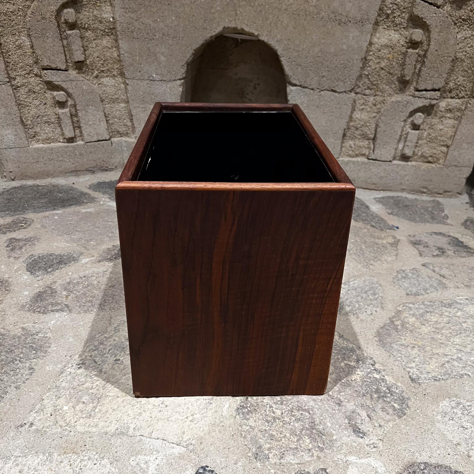 1970s MCM Walnut Wood Planter Box or Waste Basket
11.75 h x 15.5 w x 10 d
Wood box with metal insert, can be used as a planter box or a storage bin.
Preowned vintage unrestored condition.
Review images provided please.