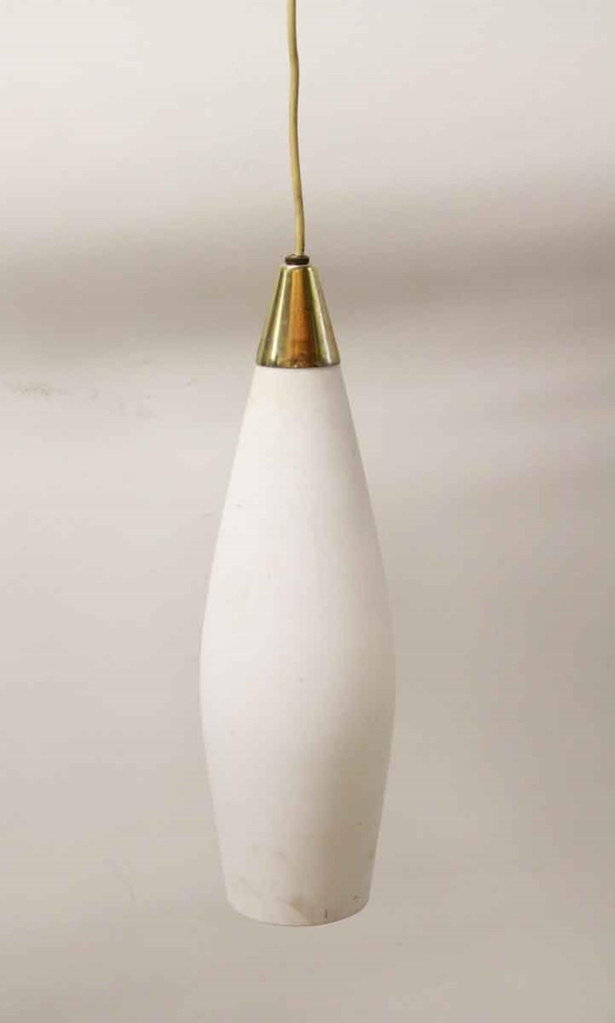 1970s simple Mid-Century Modern white glass pendant light. Some minor dark staining on shade. Please check photos. This can be seen at our 400 Gilligan St location in Scranton. PA.