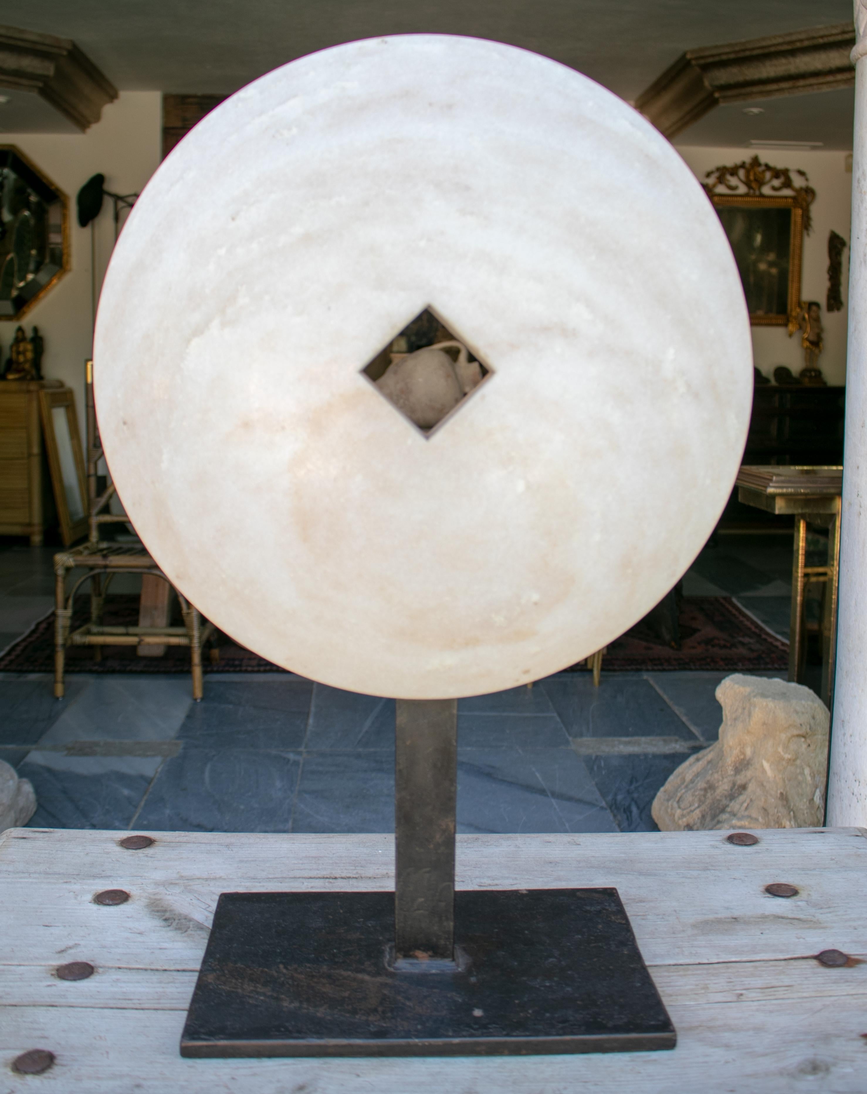 1970s modern white marble french sculpture in a iron base.
  