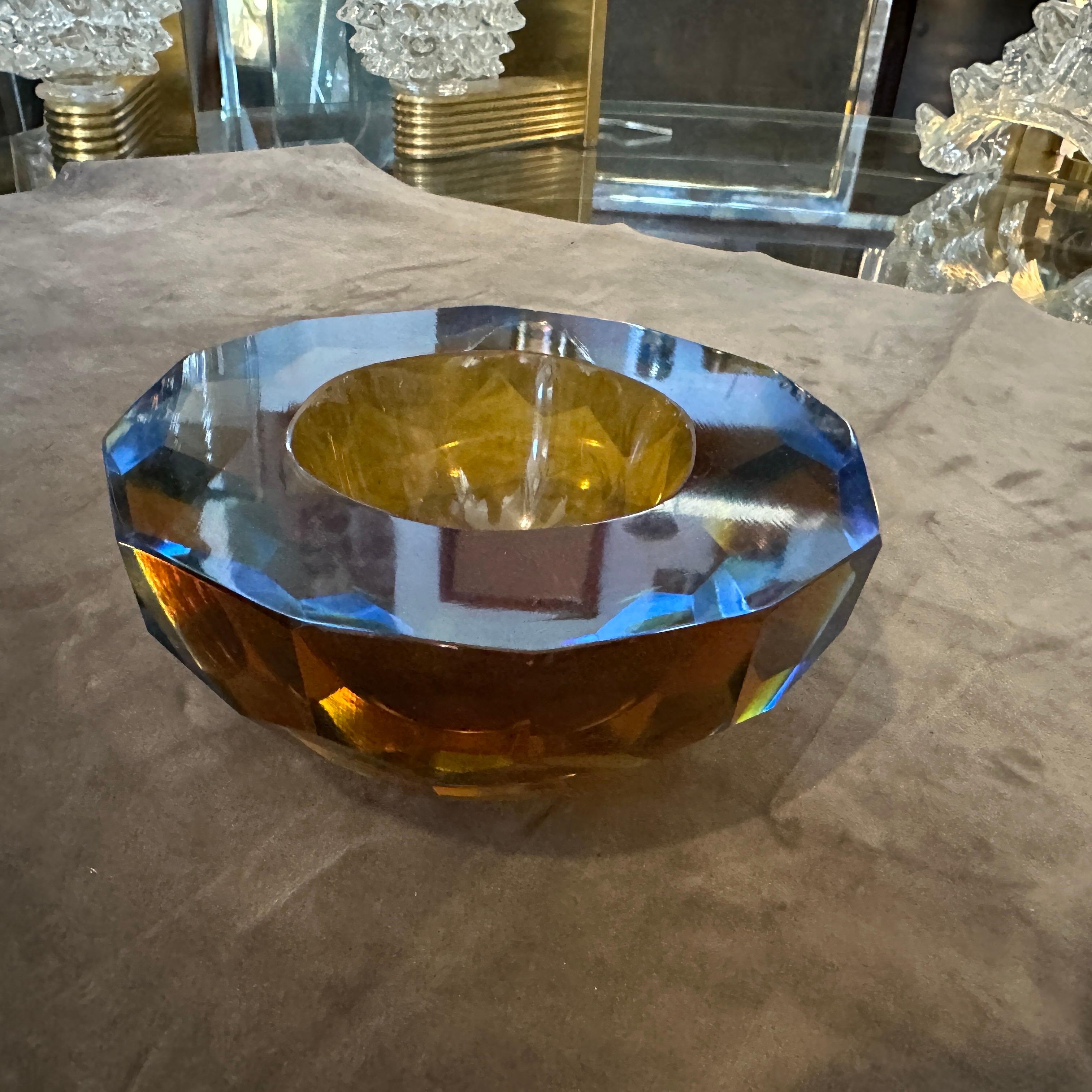 A round bowl designed and manufactured in Murano by Mandruzzato, lovely colors and very good conditions overall, it also can be used as an ashtray. A Bowl by Mandruzzato is a remarkable piece that showcases the skill and artistry of the renowned