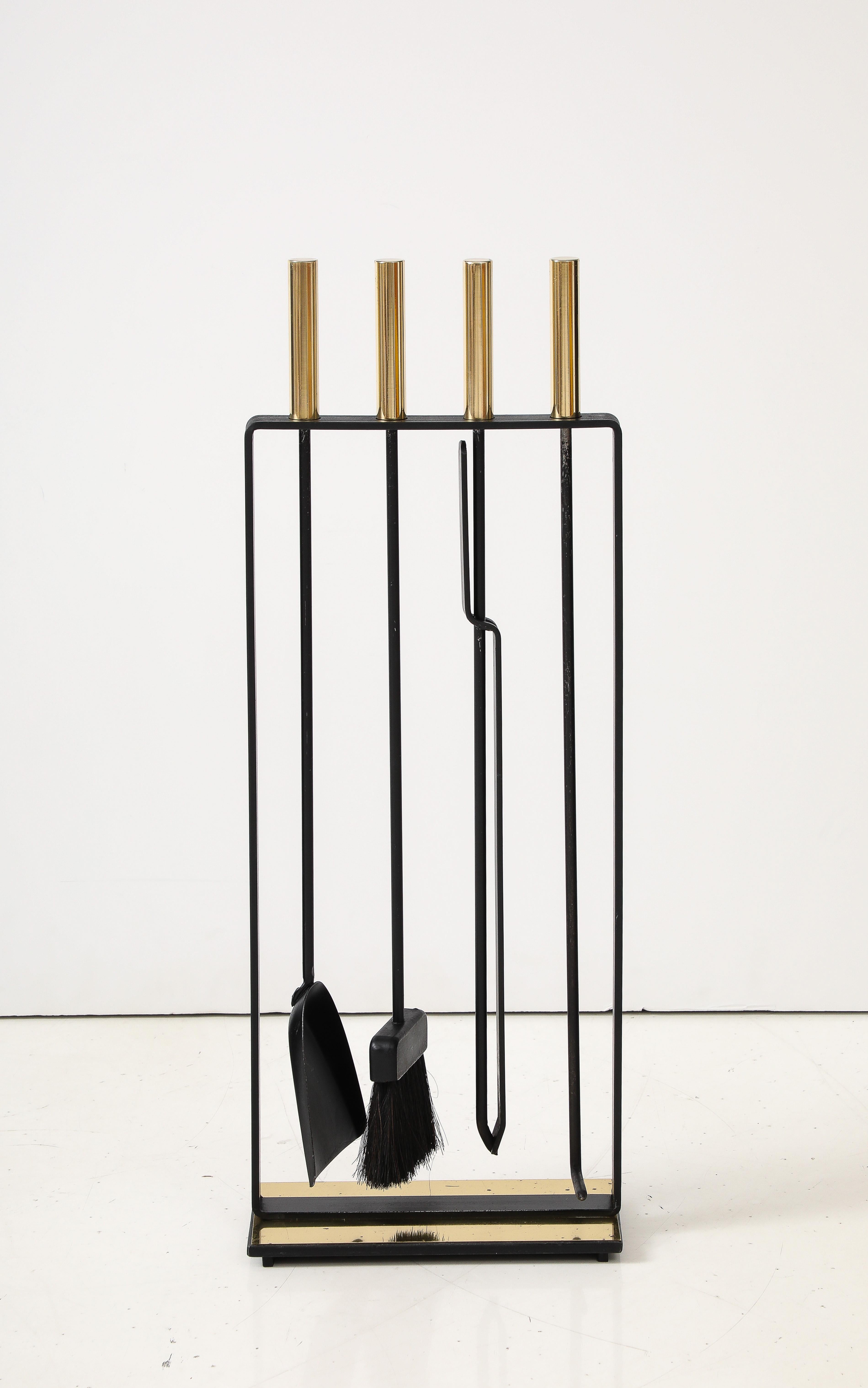 1970's Modernist brass and iron fireplace tools in the style of George Nelson, in vintage original condition with some wear and patina due to age and use..