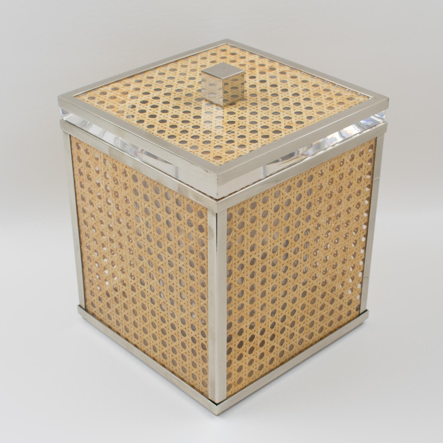 Elegant piece for a bar or cocktail party. Chrome plated metal framing with crystal clear Lucite and rattan cane work. The rattan is imbedded within two sheets of clear Lucite. Very impressive quality serving ice bucket. Aluminum insert. No visible