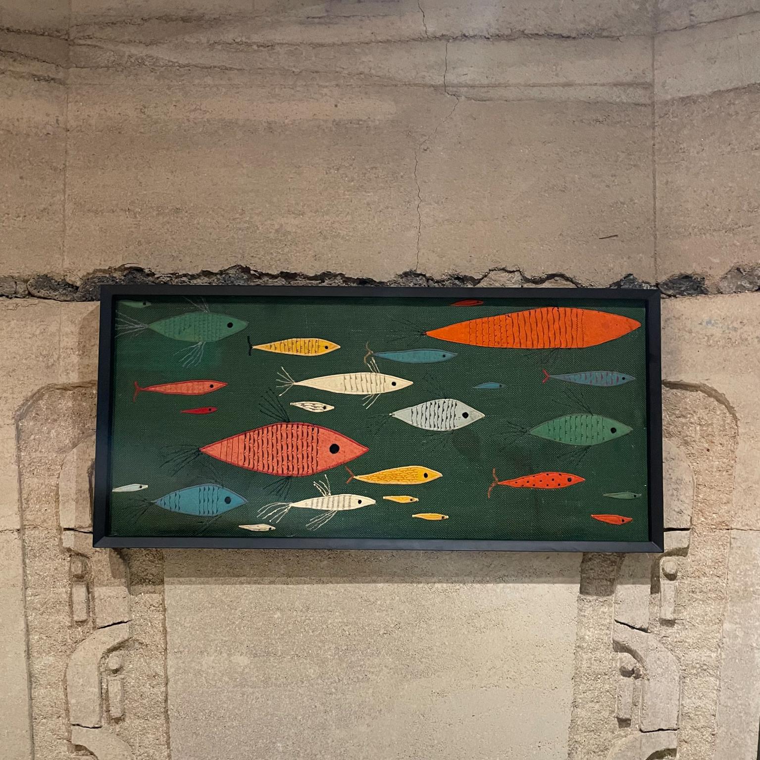 Art
Mid-Century Modern colorful school of fish art wall tapestry framed in black.
Measures: 20H x 43 W x 1.5 D.
Preowned original unrestored vintage condition.
Please review images provided.
