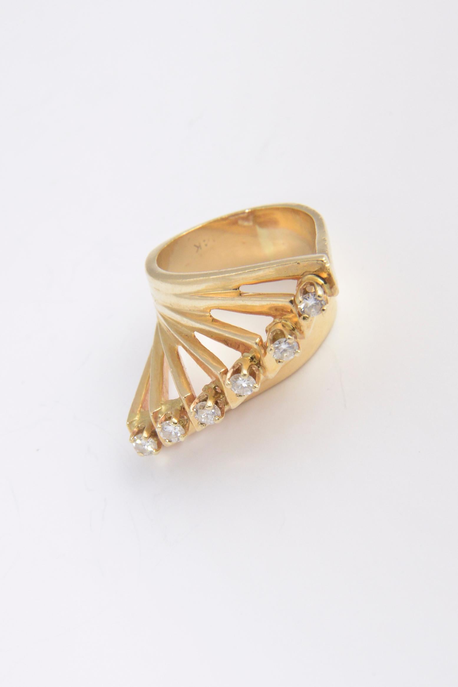 1970s Fantastic custom made modernist style ring manufactured by a jeweler for his step daughter.  The 14k yellow gold ring features a row of raised triangles that are diagonal.   At the tip of each triangle is a diamond that weight approximately