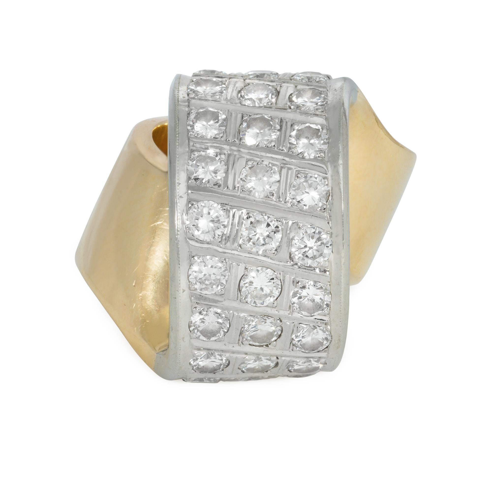 A Modernist two-color gold and diamond statement ring of stylized dimensional loop design, in 18k.  Atw diamonds 2.70 cts.

Face-up measurements of diamond segment: 1