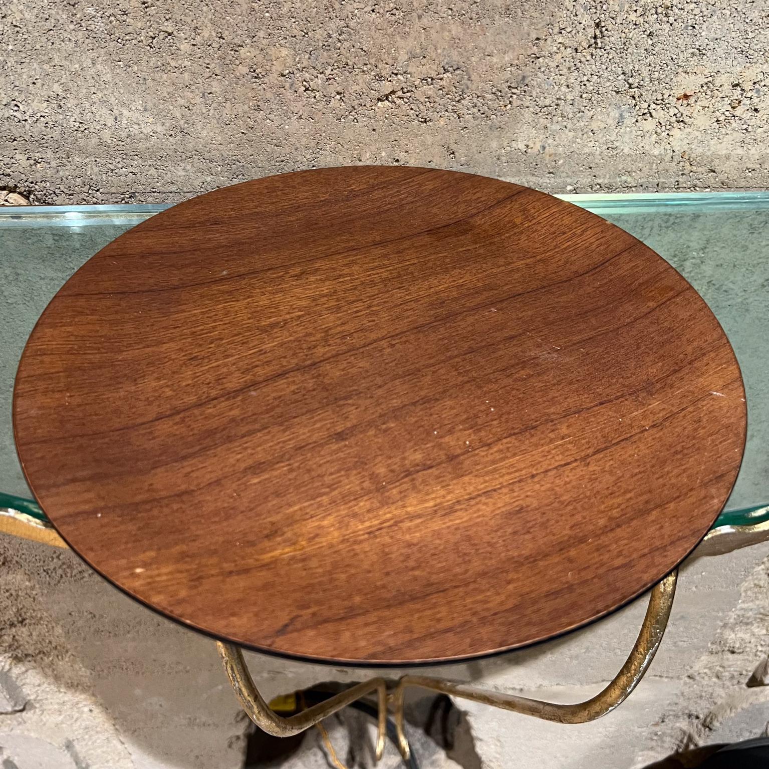 1970s Modernist Teak Wood on Black Plate
1 h x 12.13 diameter
Preowned unrestored vintage condition, not new.
Refer to all images provided.