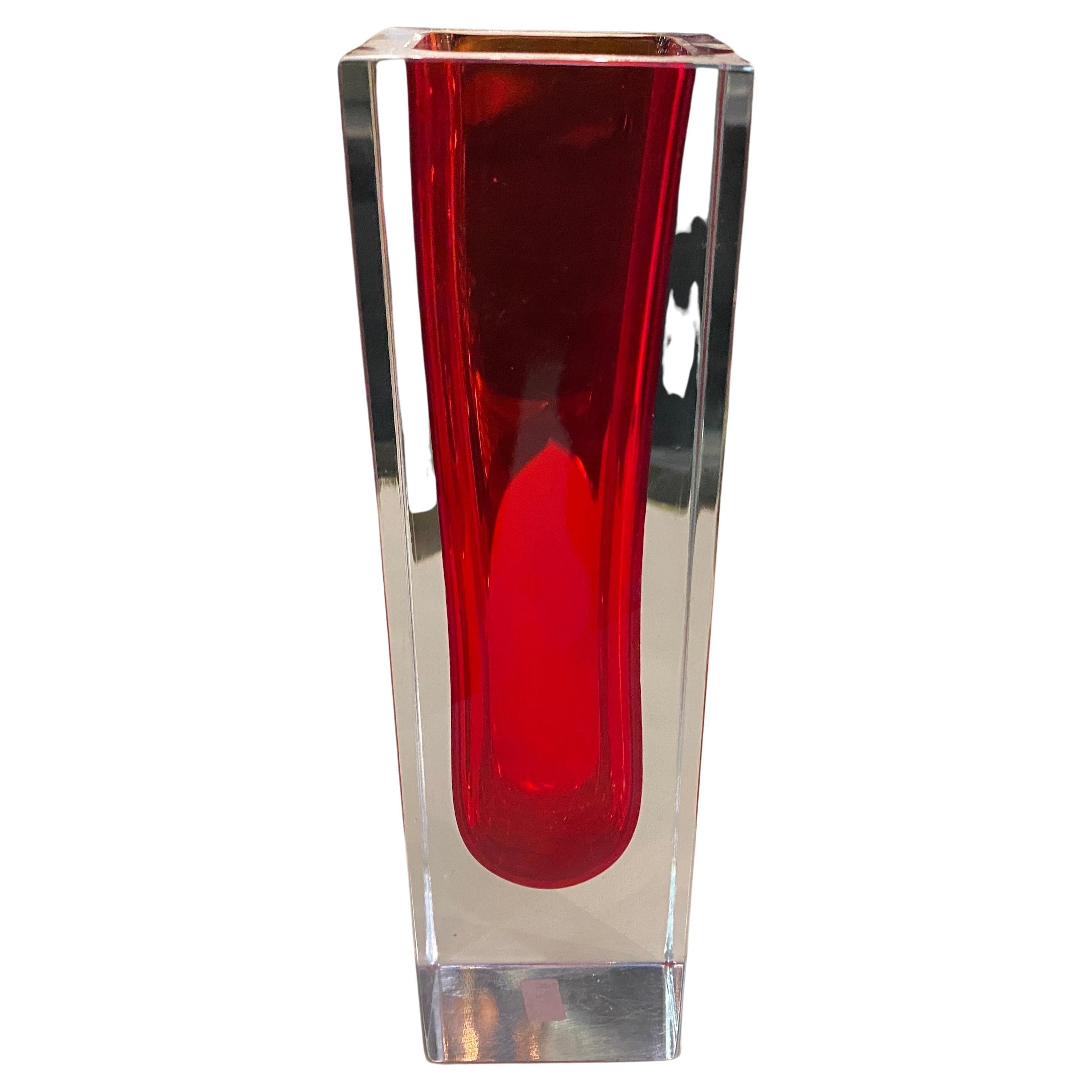 A modernist red heavy murano glass square vase designed and manufactured in Italy by Mandruzzato. The vase it's in perfect conditions. Mandruzzato was an Italian glass company that produced high-quality glassware in the Murano tradition from the