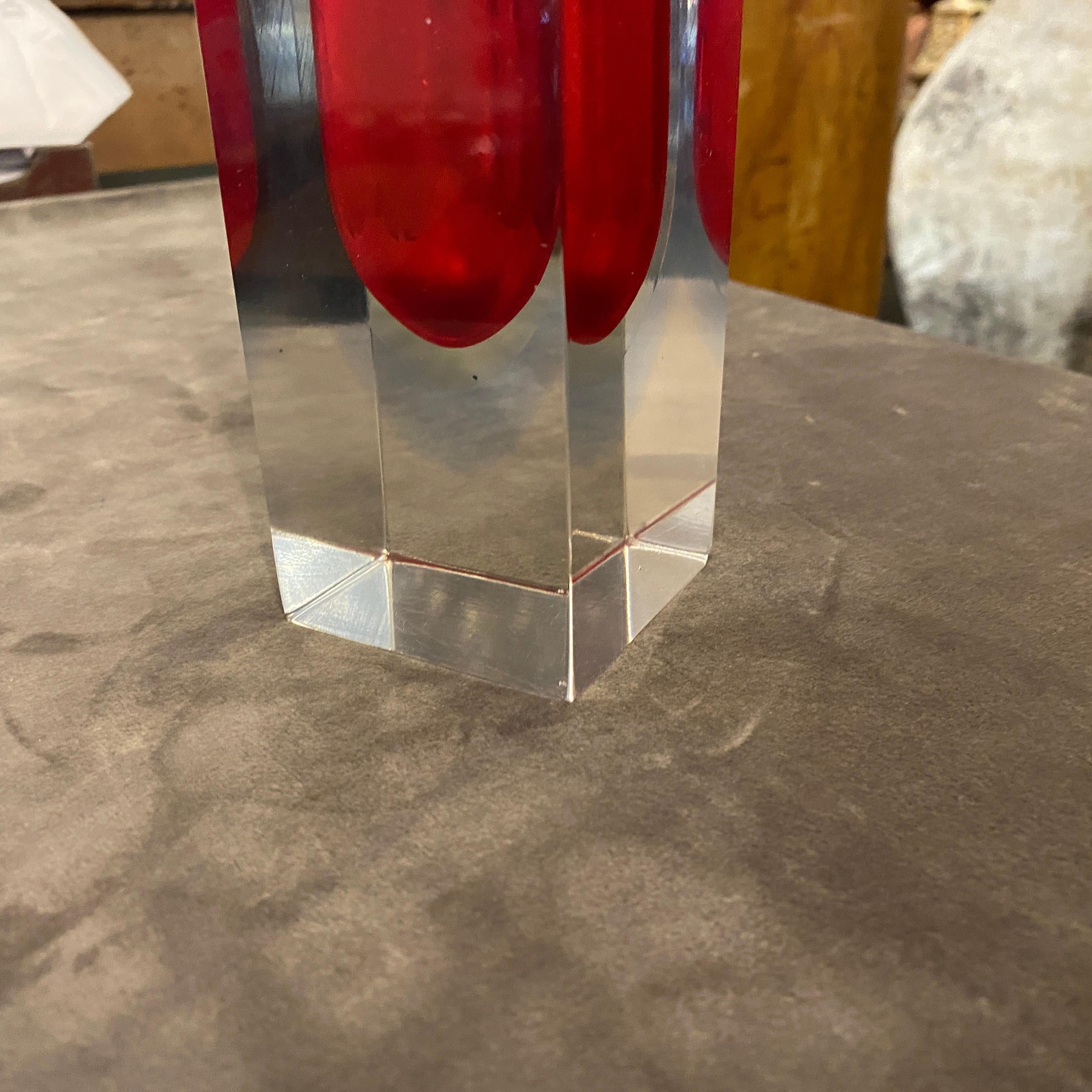 A red murano glass square vase made in the Seventies in very good conditions. It has been realized with the Sommerso technique