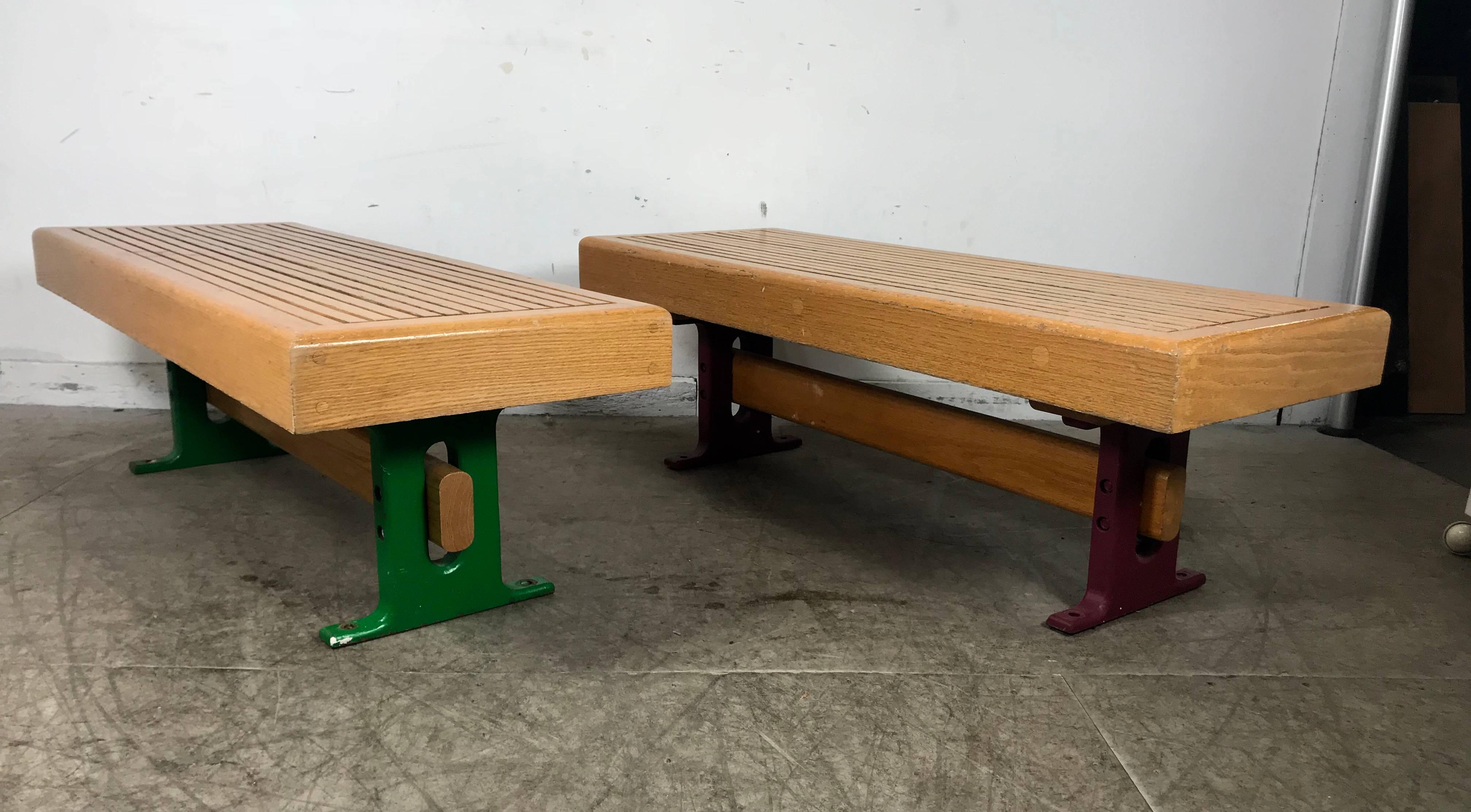 1970s modernist wood and cast iron architectural garden, gallery benches, heavy slat oakwood construction, cast iron bases, Industrial yet elegant design.