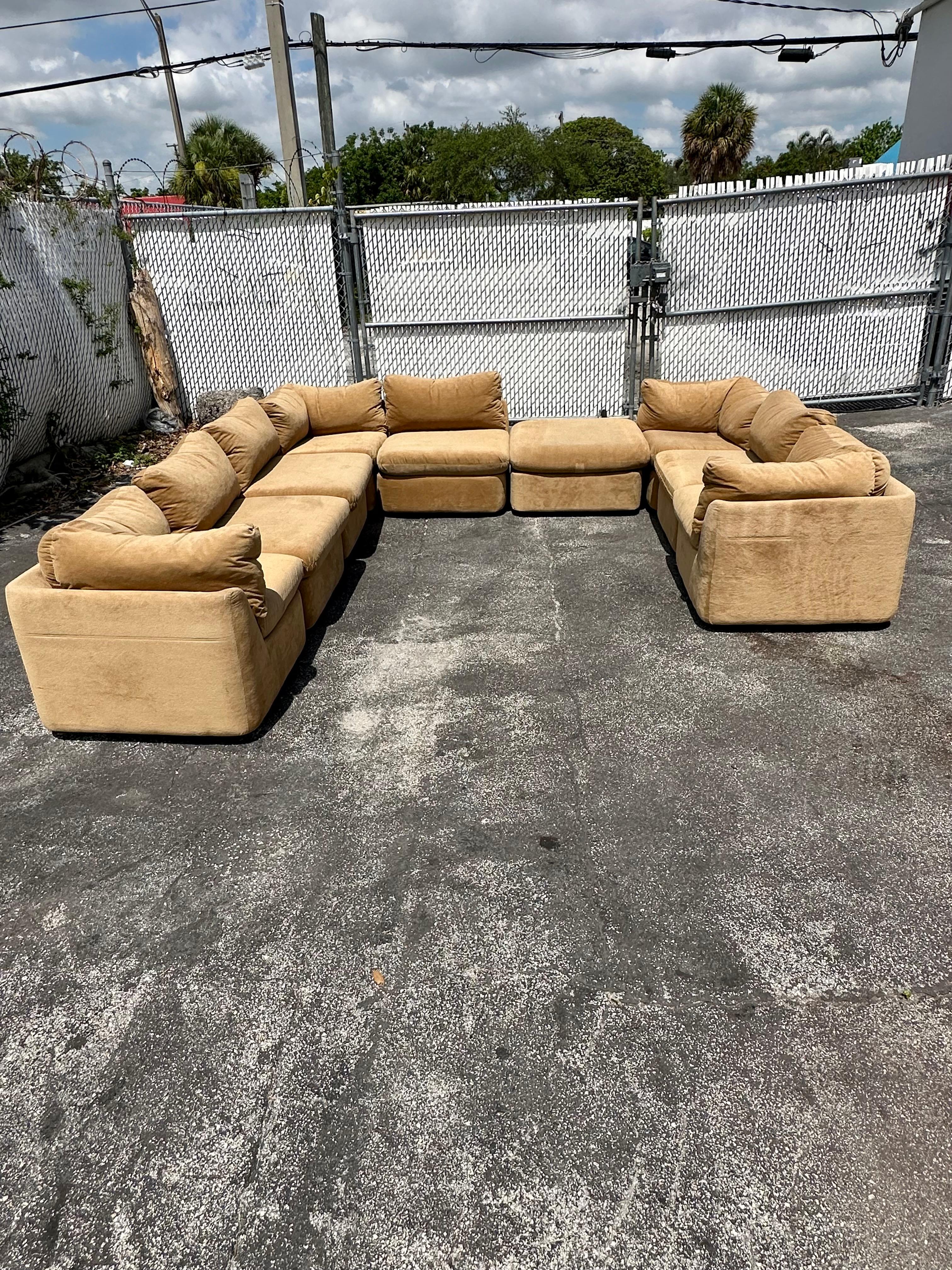 Transport yourself back to the sleek and sophisticated 1970s with this exquisite modular, camel mohair, 9 pieces sectional sofa. The ultra rare sectional exudes an air of luxury and refinement. Outstanding design is exhibited throughout. The