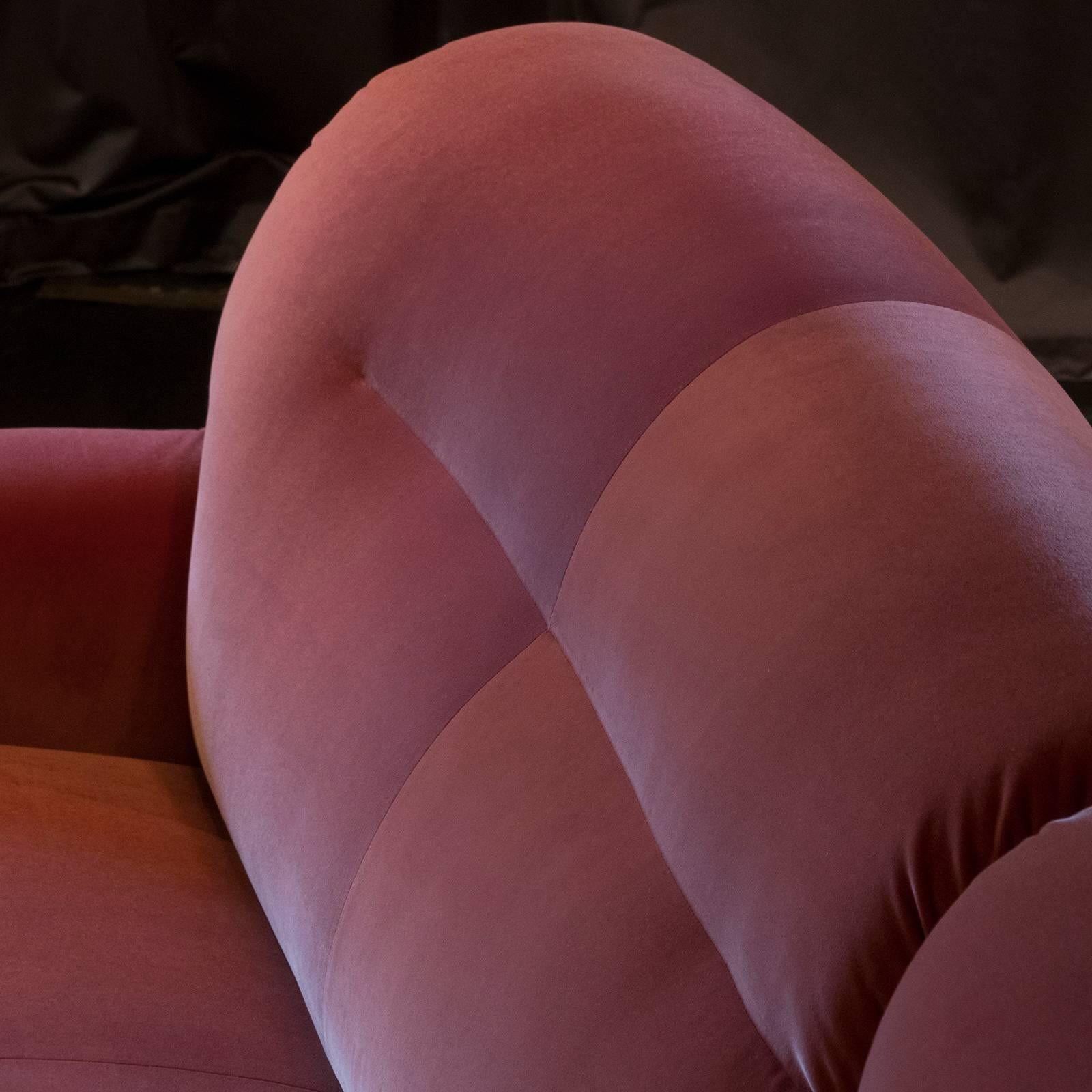 Italian three-piece curved sectional, original vintage structure newly reupholstered in coral velvet, wood details.