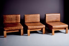 1970s Modular seating group of three lounge chairs in oak and leather, Germany