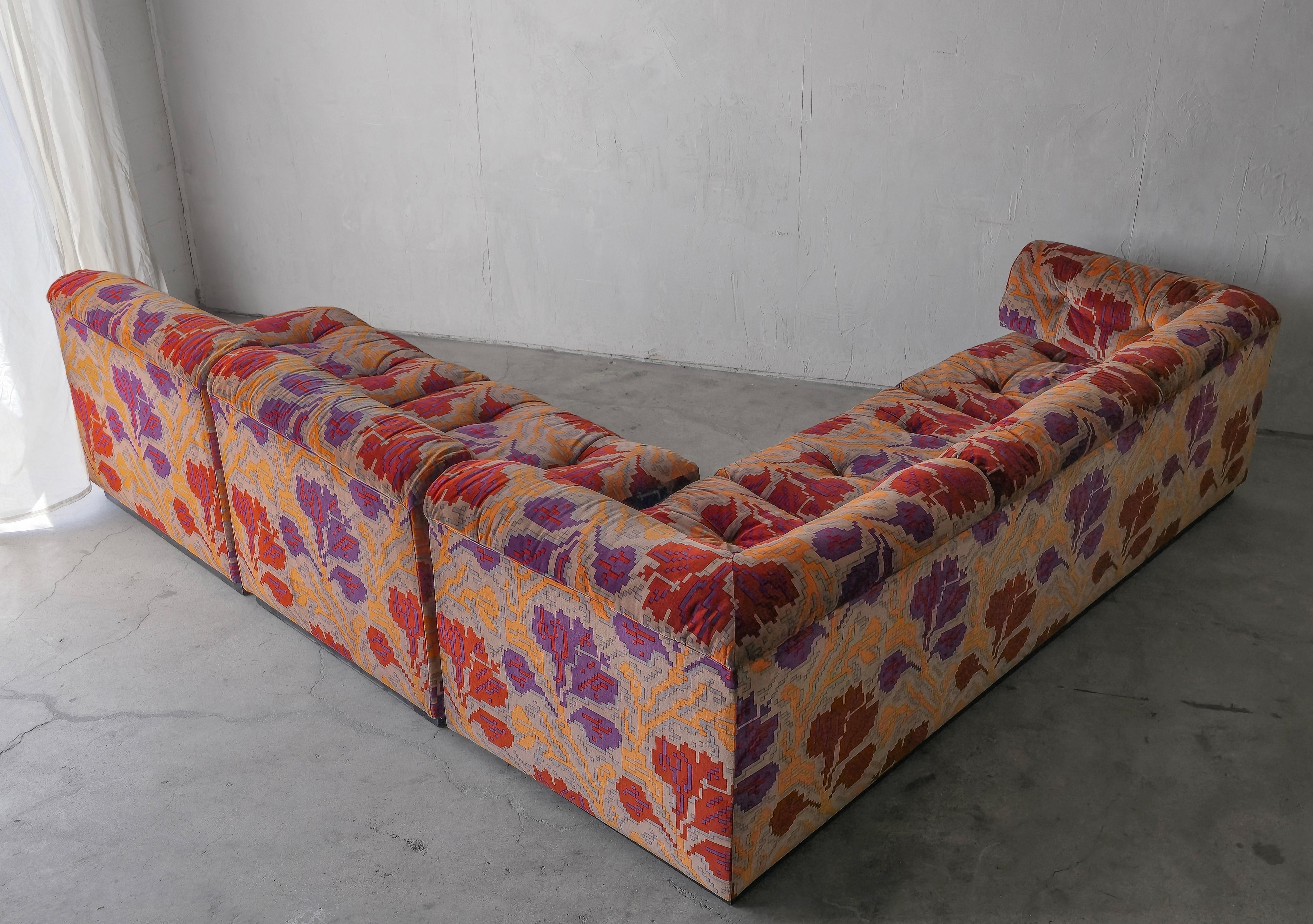Great 3-piece semi-modular sectional sofa by Milo Baughman for Directional.  We love, love, love the all original colorful Jack Lenor Larsen fabric in a subtle, sort of digi-floral pattern in shades of plum purple, rust red, gray and dark orange on