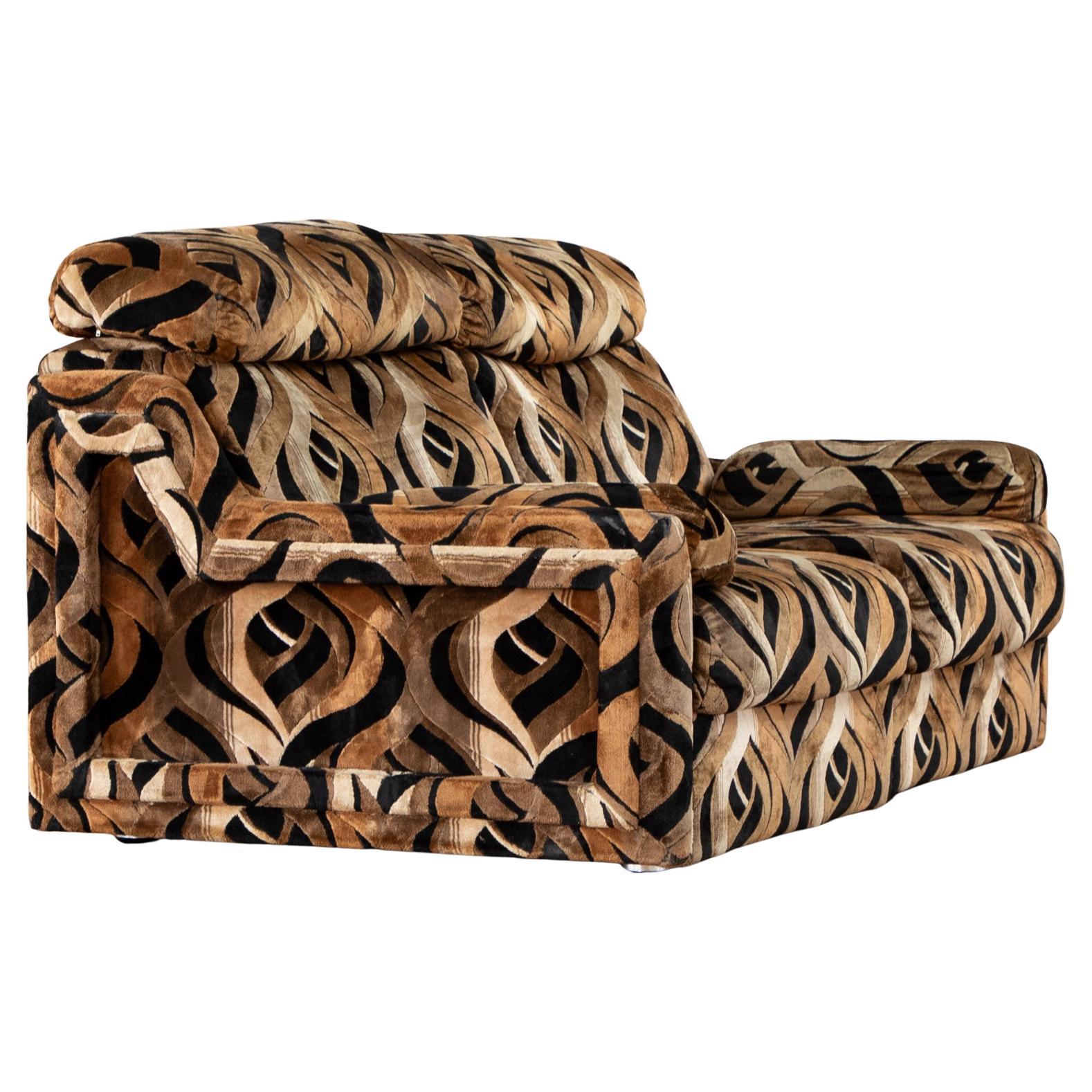 Retro 70s velvet sofa by Englender. Amazing pattern in shades of brown, black, caramel and beige.
Real statement piece.
Extremely comfy.
Original upholstery - too good to change!
Modular - 2 sections with armrests

The head rest cushions can be