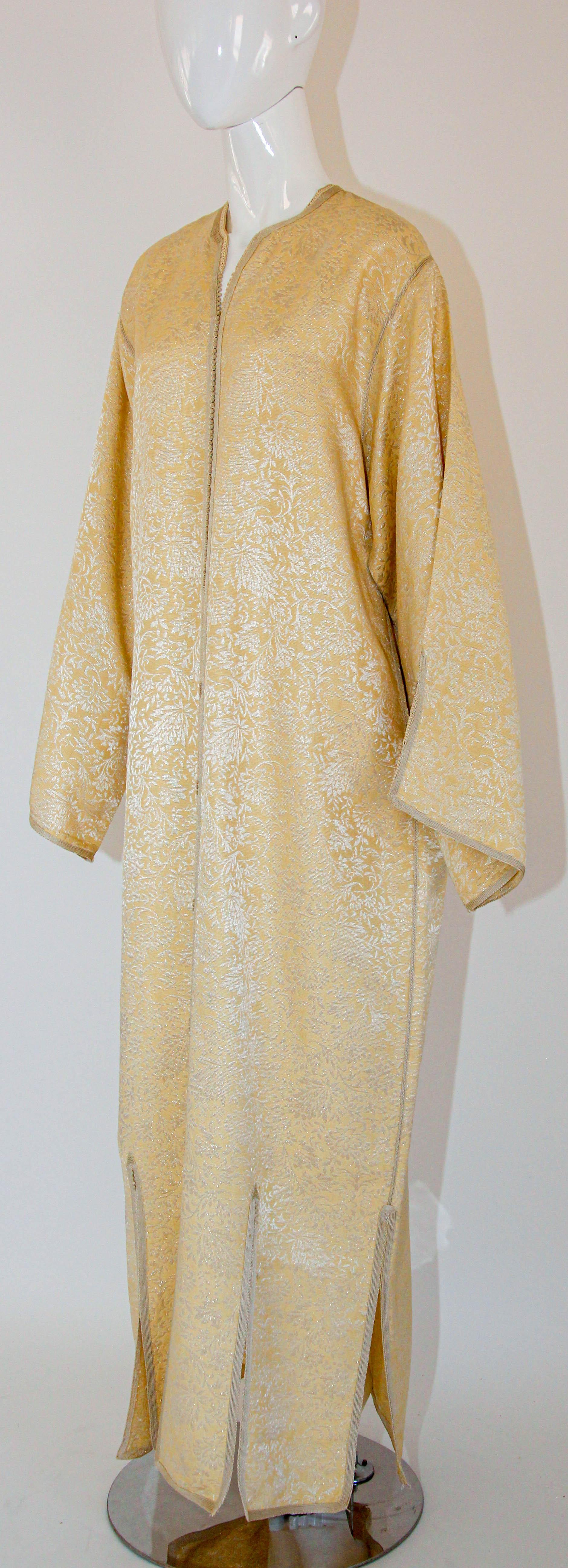 1970s Moroccan vintage caftan is a timeless and captivating piece of clothing that embodies the essence of Moroccan culture and style from that era. 
This stunning caftan showcases the exquisite craftsmanship and vibrant aesthetic that defined