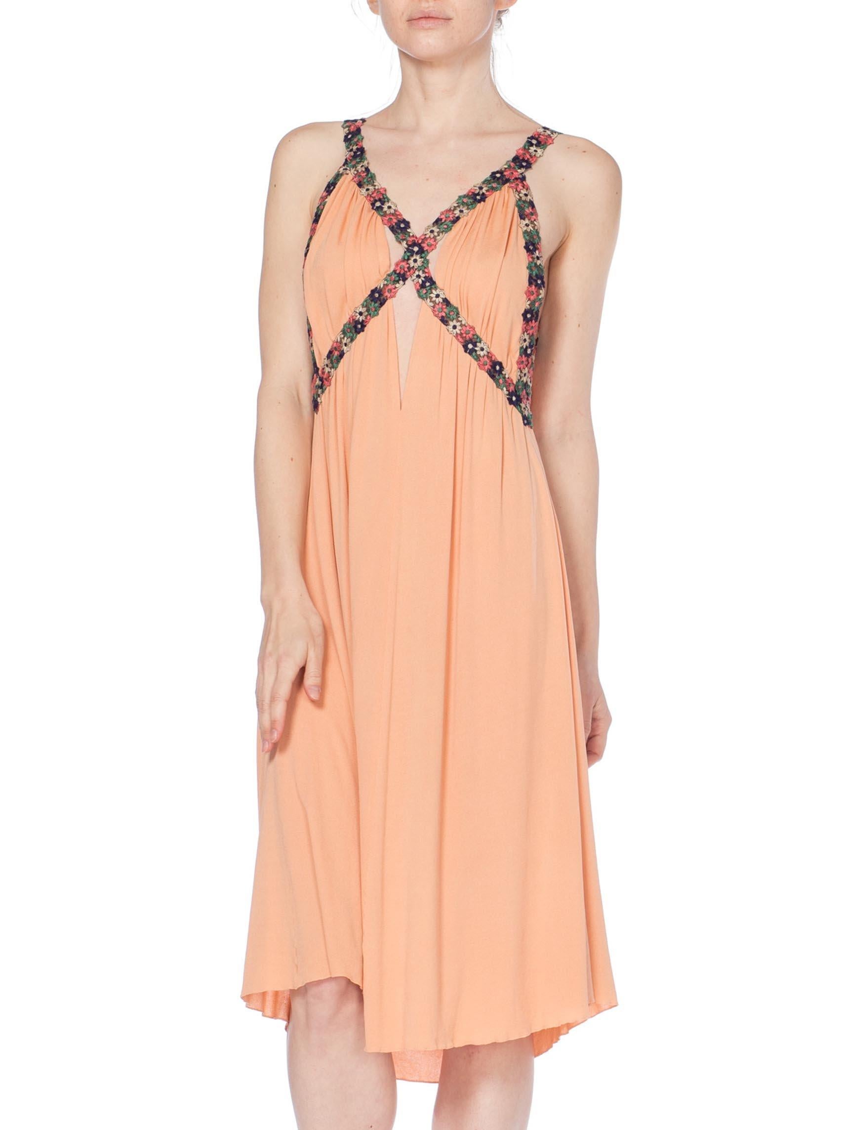 Orange MORPHEW COLLECTION Peach Silk Jersey Dress With Cutout Front & 1930S Floral Trim For Sale