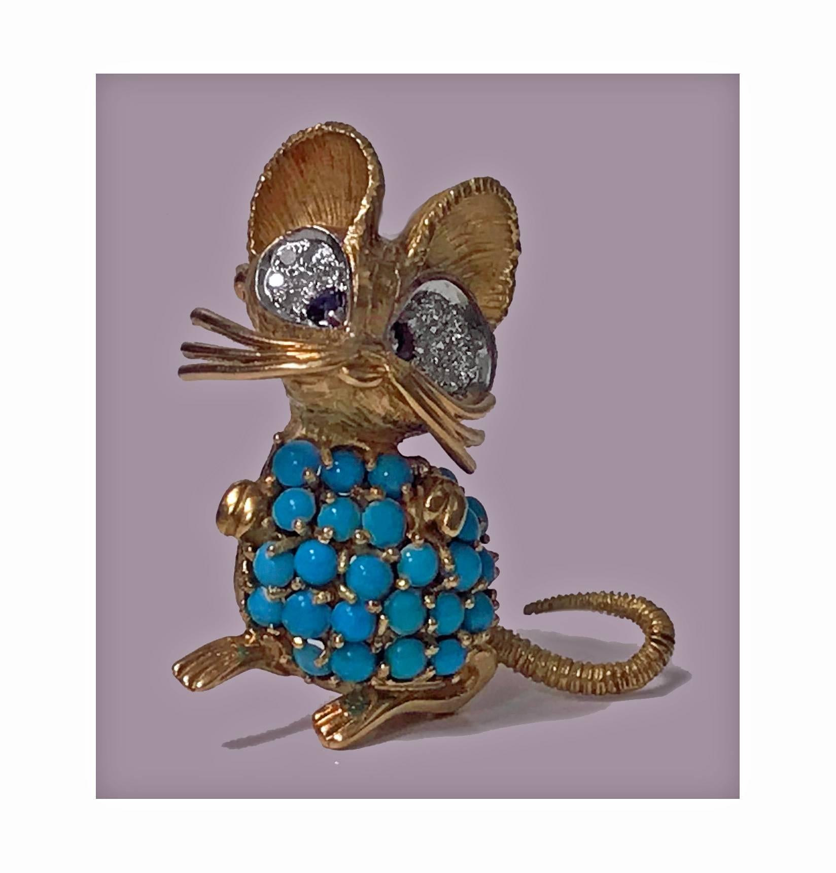 1970s whimsical mouse brooch pin 18-karat diamond, turquoise and sapphire. The body with 28 small cabochon turquoise, the eyes white gold set with 2 small round blue sapphire and a total of thirteen single cut diamonds, ears, whiskers, tail and feet