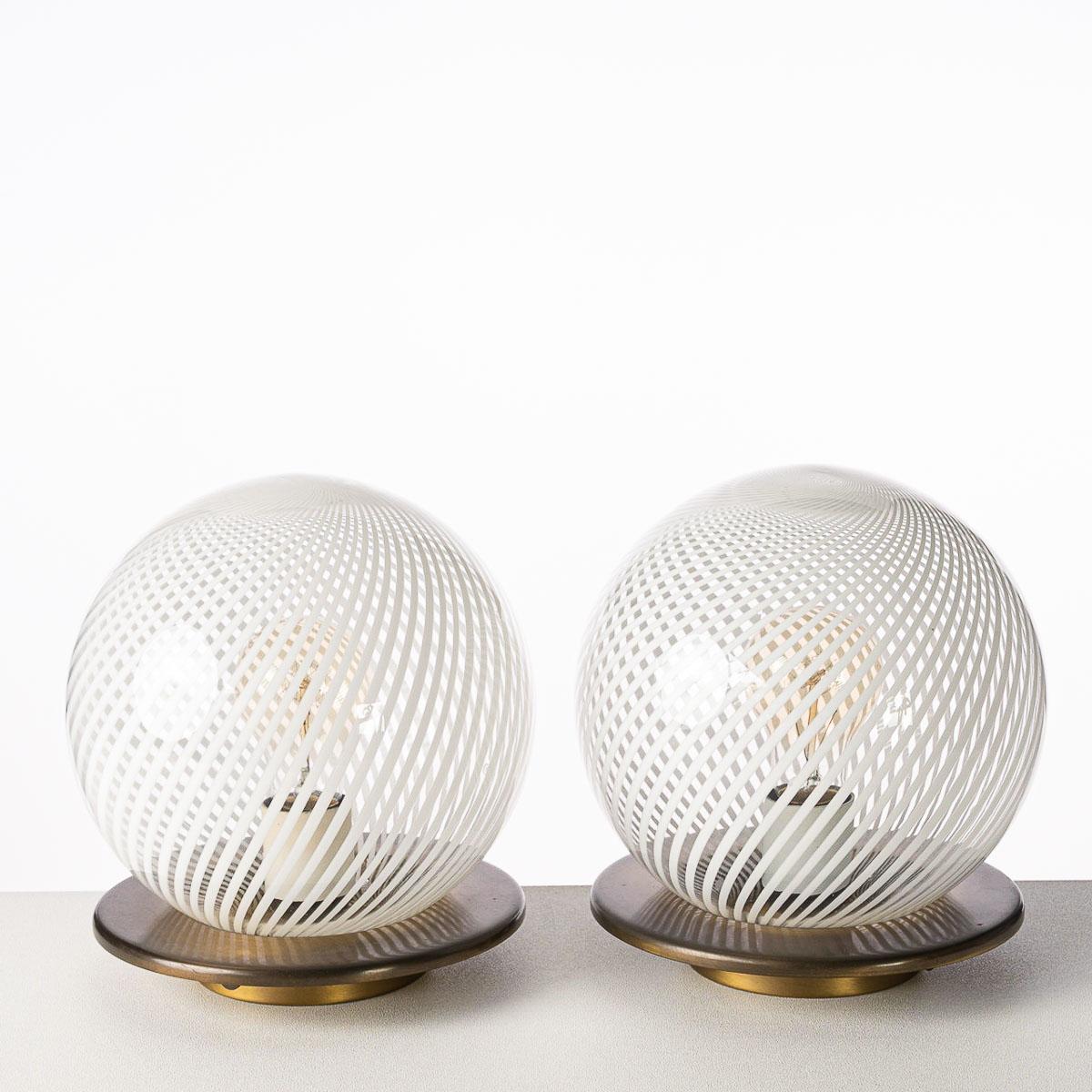 These Classic table lamps are perfectly hand blown from white and clear Murano glass, attributed to Venini, circa 1970.