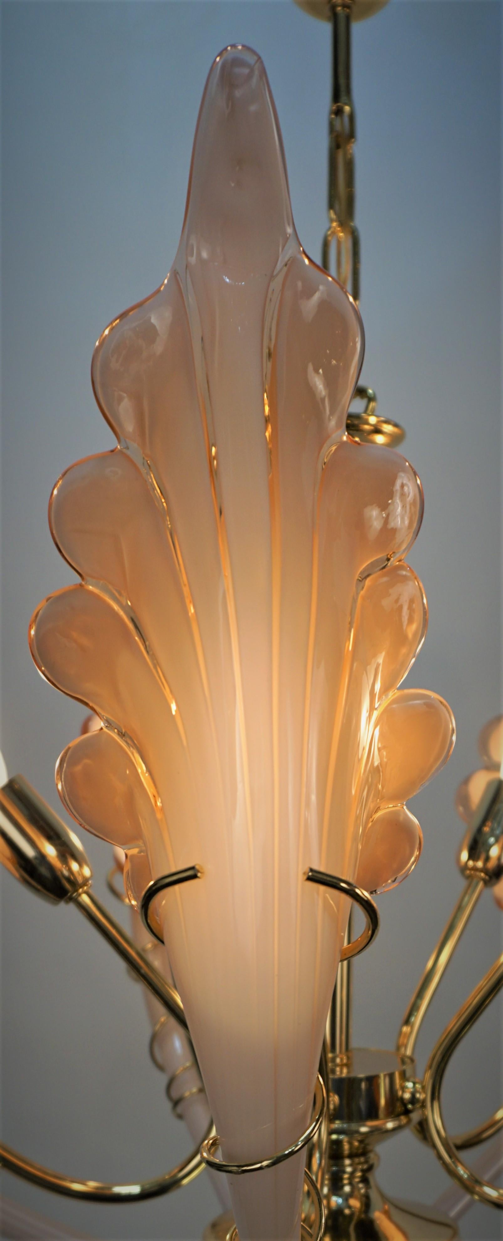 Blown glass flora shape in pink-beige with polished gilt bronze frame chandelier.