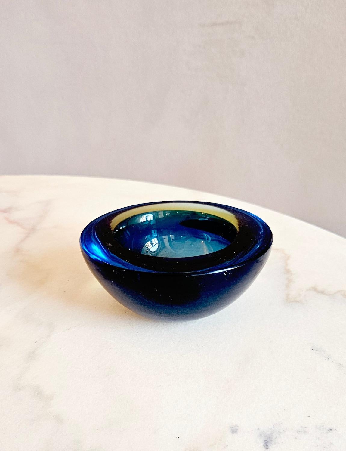 A beautiful hand-blown sommerso Murano glass bowl in deep navy with hint of grey/green.