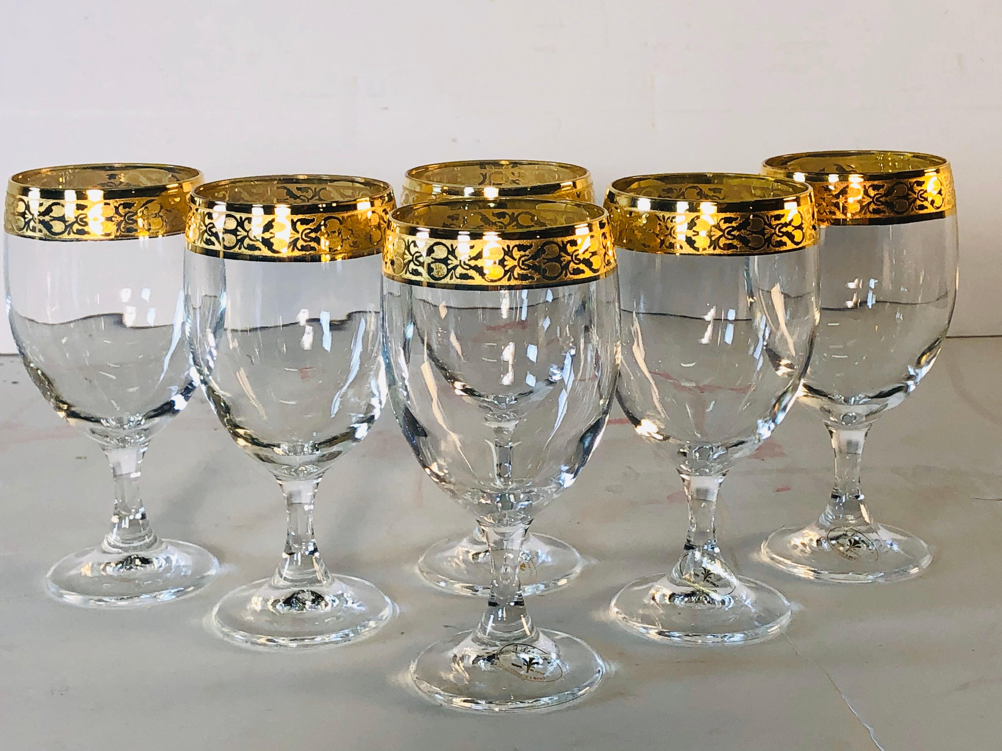 Vintage 1970s set of six Italian Mirano glass wine stems with a wide gold banded rim. Marked with a plastic label. Excellent condition.