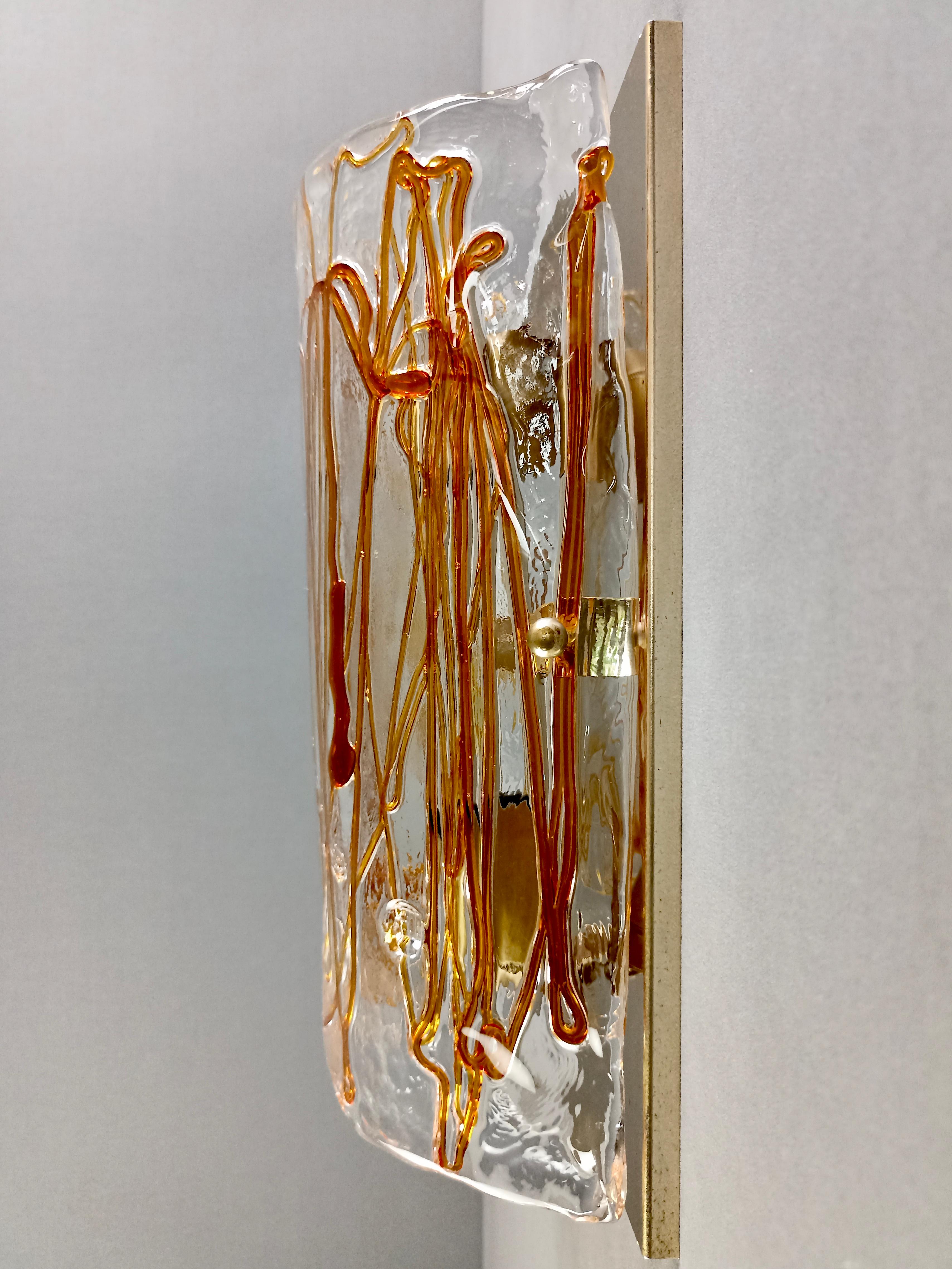 Hand-Crafted 1970s Murano La Murrina art glass and gilded metal wall lamp. For Sale