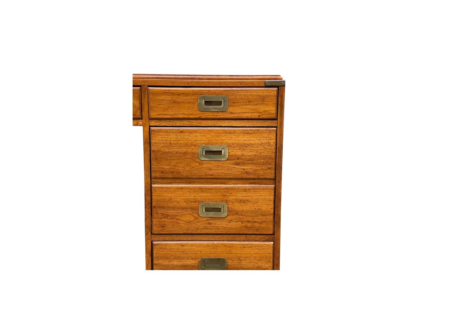 Another good looking campaign style piece for your collection! We are delighted to offer for sale this vintage executive desk hand crafted in the Military Campaign style by Mt. Airy, which is one of the higher quality campaign manufacturers. This