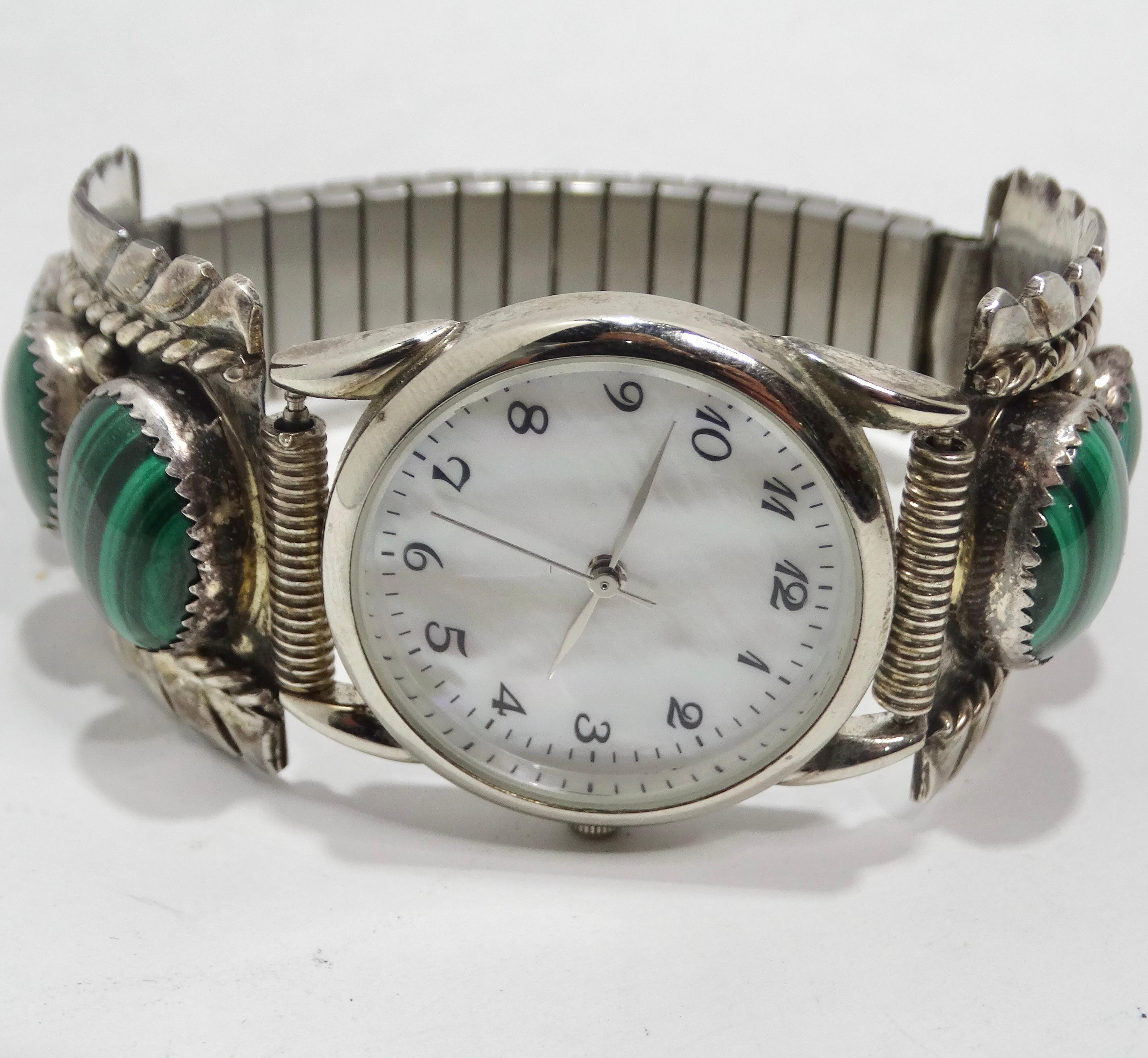 Introducing the 1970s Native American Silver Malachite Stone Watch—a breathtaking statement piece that transcends time and fashion. This watch isn't just a timekeeping accessory; it's a wearable work of art that exudes Native American craftsmanship