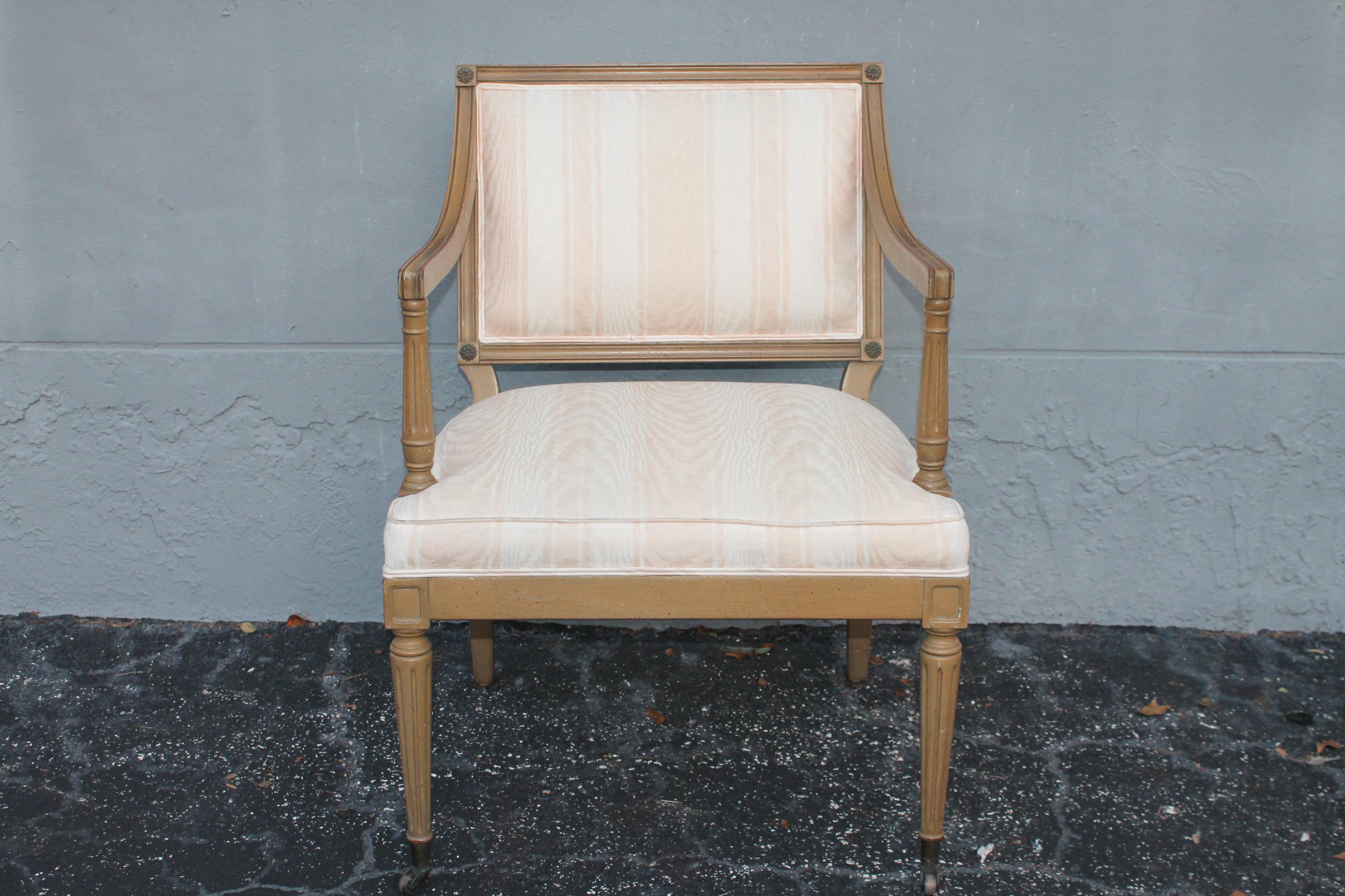 Very High Quality Arm Chair by John Widdicomb. Front legs have brass wheels. Undulating Textile. Light peach striped fabric. Beautiful quality Chair.