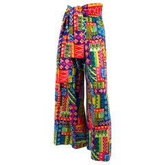 Pantalones palazzo de tela de corteza con estampado neón de los años 70