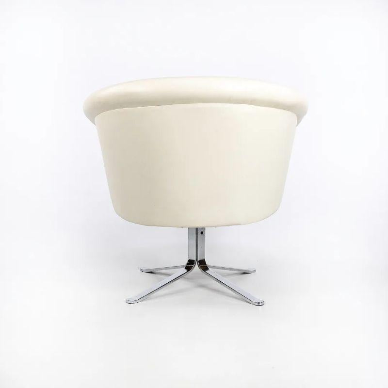 American 1970s Nicos Zographos Bucket Swivel Armchair in White Leather Polished Stainless For Sale