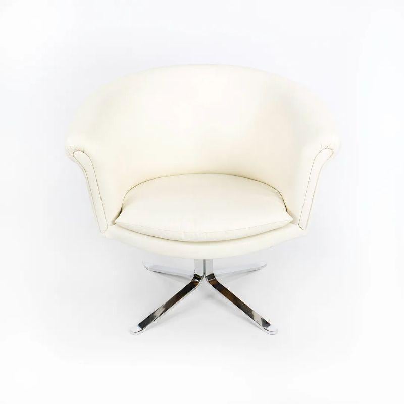 1970s Nicos Zographos Bucket Swivel Armchair in White Leather Polished Stainless In Good Condition For Sale In Philadelphia, PA