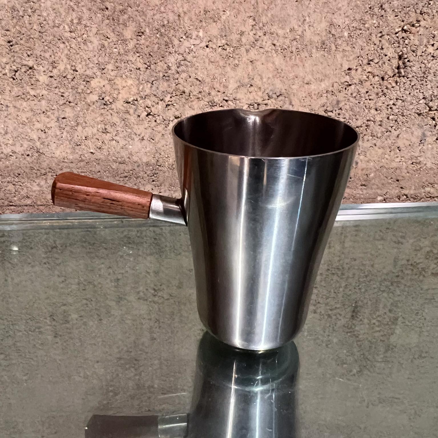 AMBIANIC presents
NMT Stainless Espresso Mini Pitcher Creamer Denmark
3.25 h x 4.25 w x 2.63 d
Stainless Steel and Teak
Preowned vintage condition
See all images.