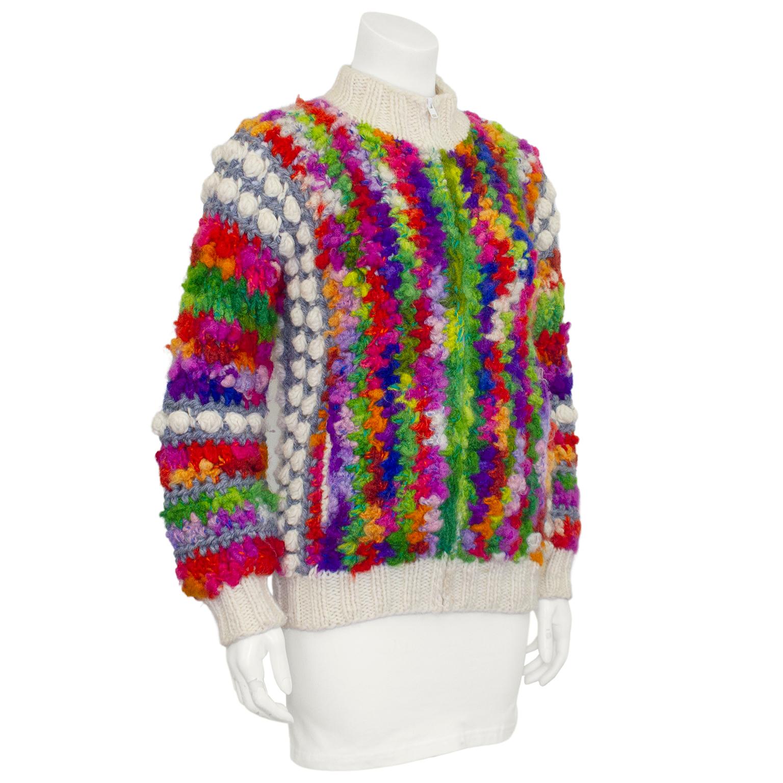 Cute, colorful and cozy hand knit rainbow colored bomber jacket and matching hat by Norma of Canada knits. Her boutiques were well known destinations for savvy international shoppers in Toronto and Calgary during the 1960's and 70's. Her creations