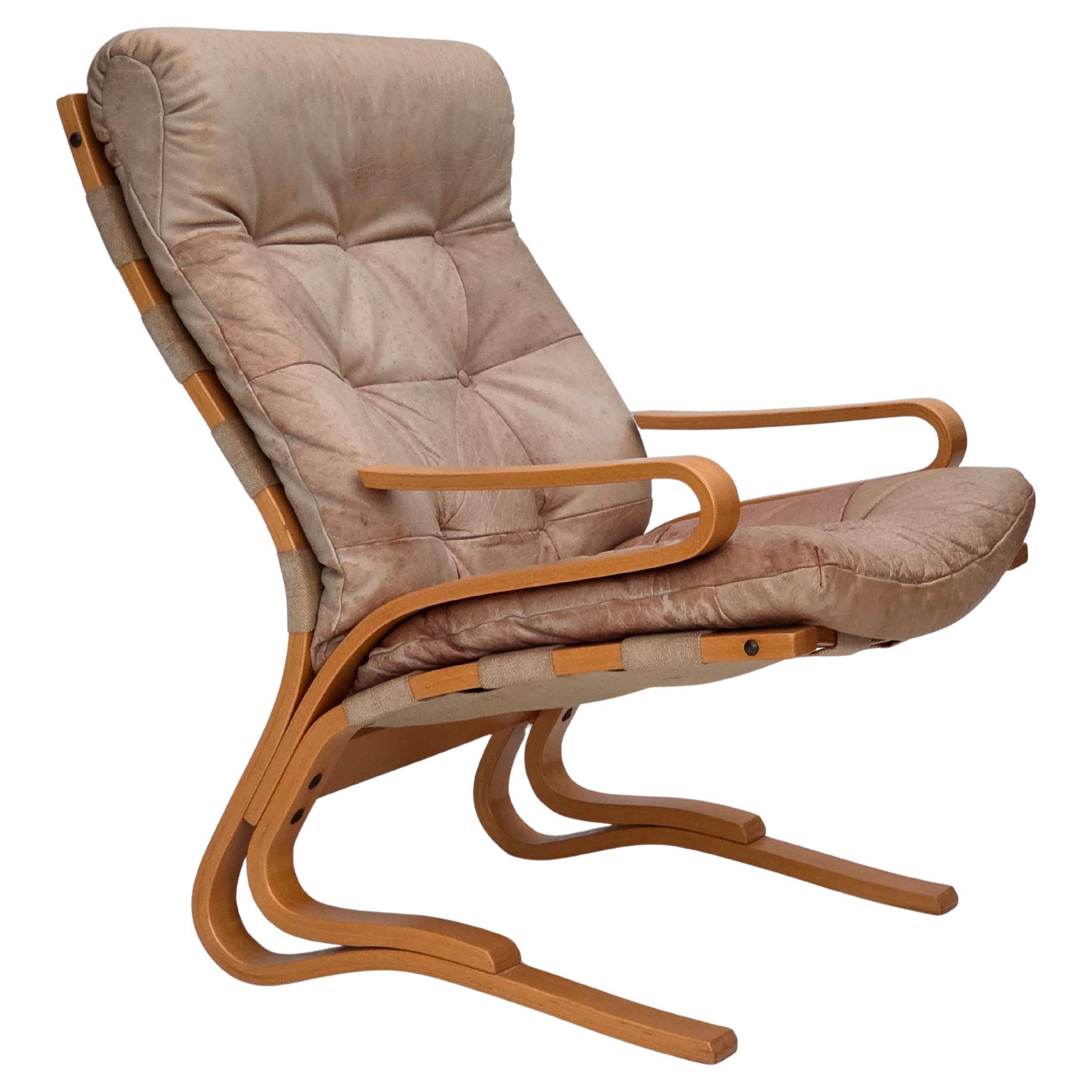 1970s, Norwegian armchair, model "Kengu", beige furniture leather. For Sale