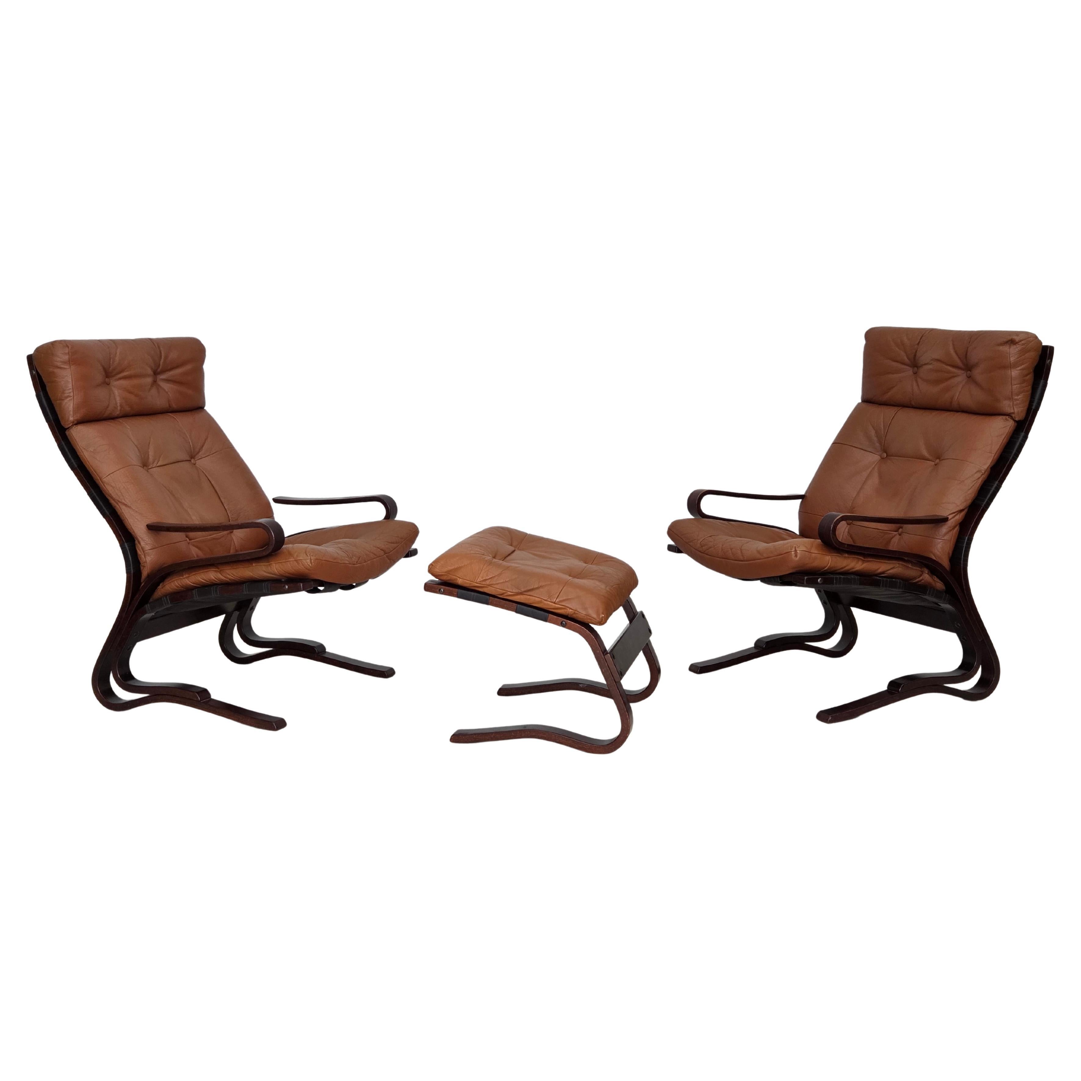1970s, Norwegian design by Else & Nordahl Solheim, set of 2 chairs, footstool. For Sale