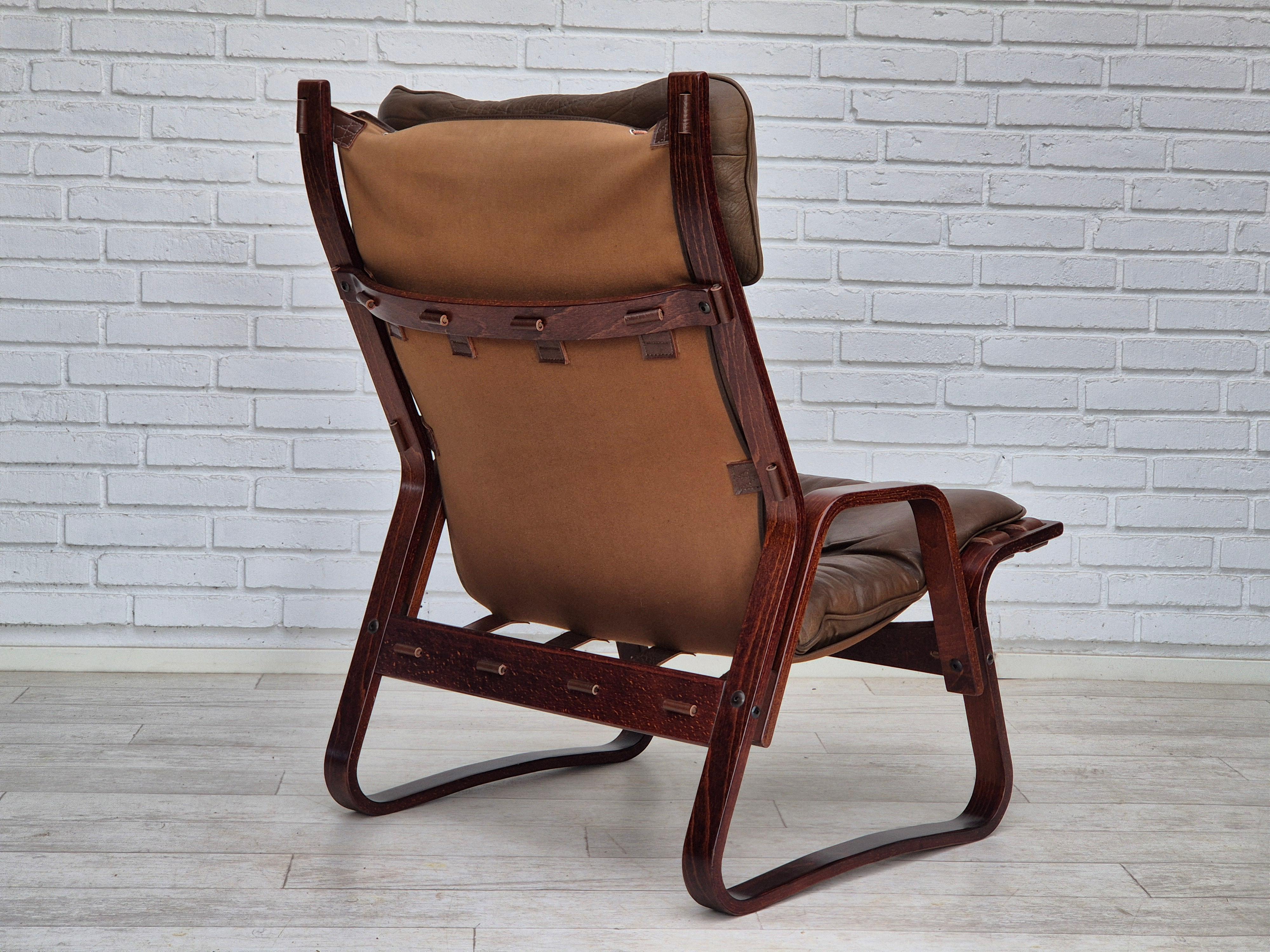 Late 20th Century 1970s, Norwegian design, lounge chair with footstool, original condition. For Sale