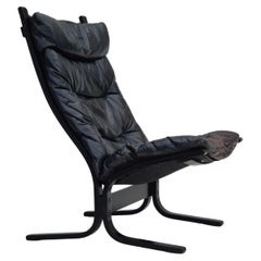 1970’s, Norwegian design, "Siesta" lounge chair by Ingmar Relling, black leather