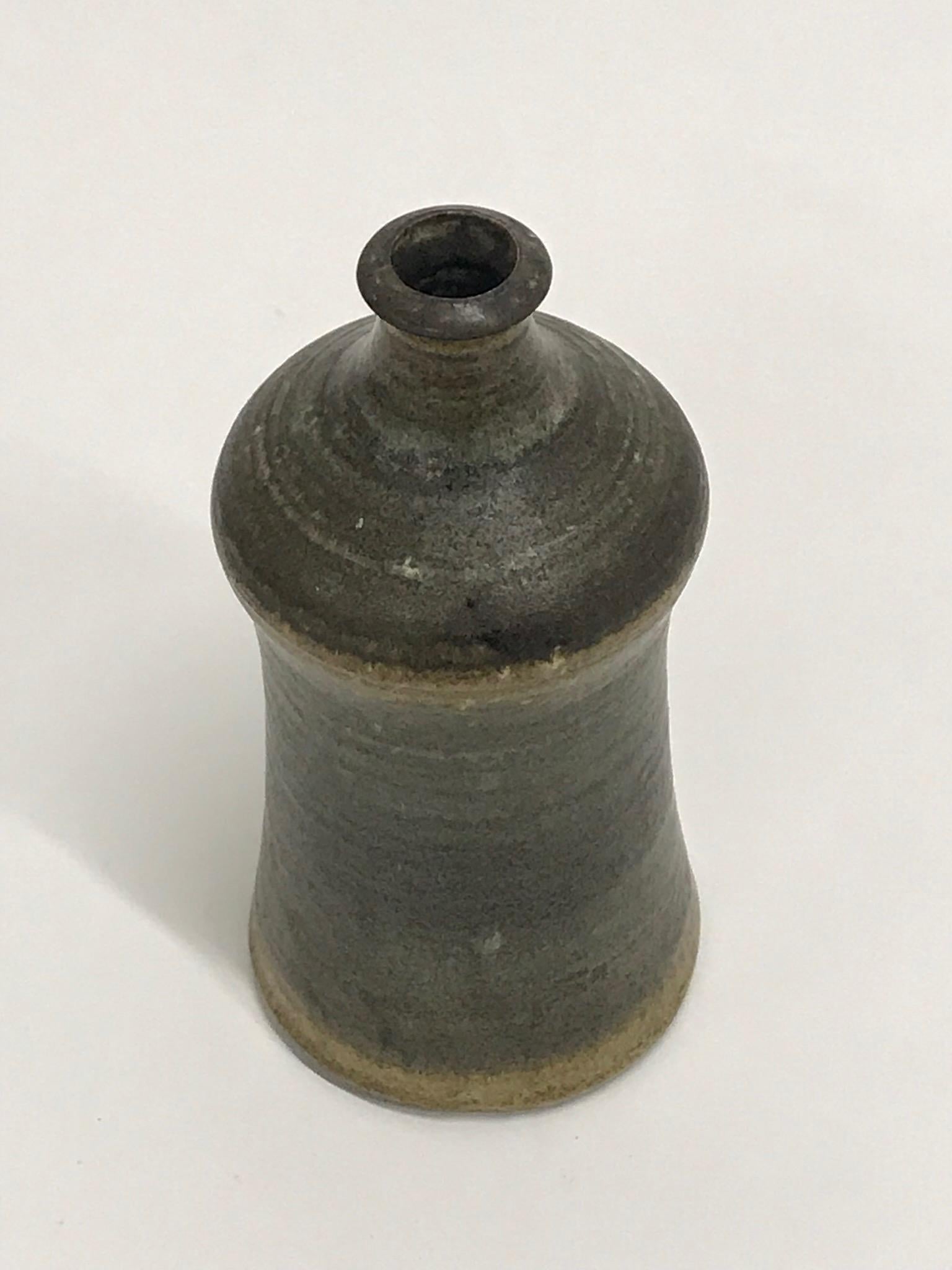 1970's Norwegian Earthy Ceramic Vase by Turid Mjelve
Signed on base Turid Mjelve Norway. Created in her own studio.
Ceramics by Turid Mjelve are rarely seen outside of Scandinavia.

Turid Mjelve is a Norwegian potter. She is especially known for