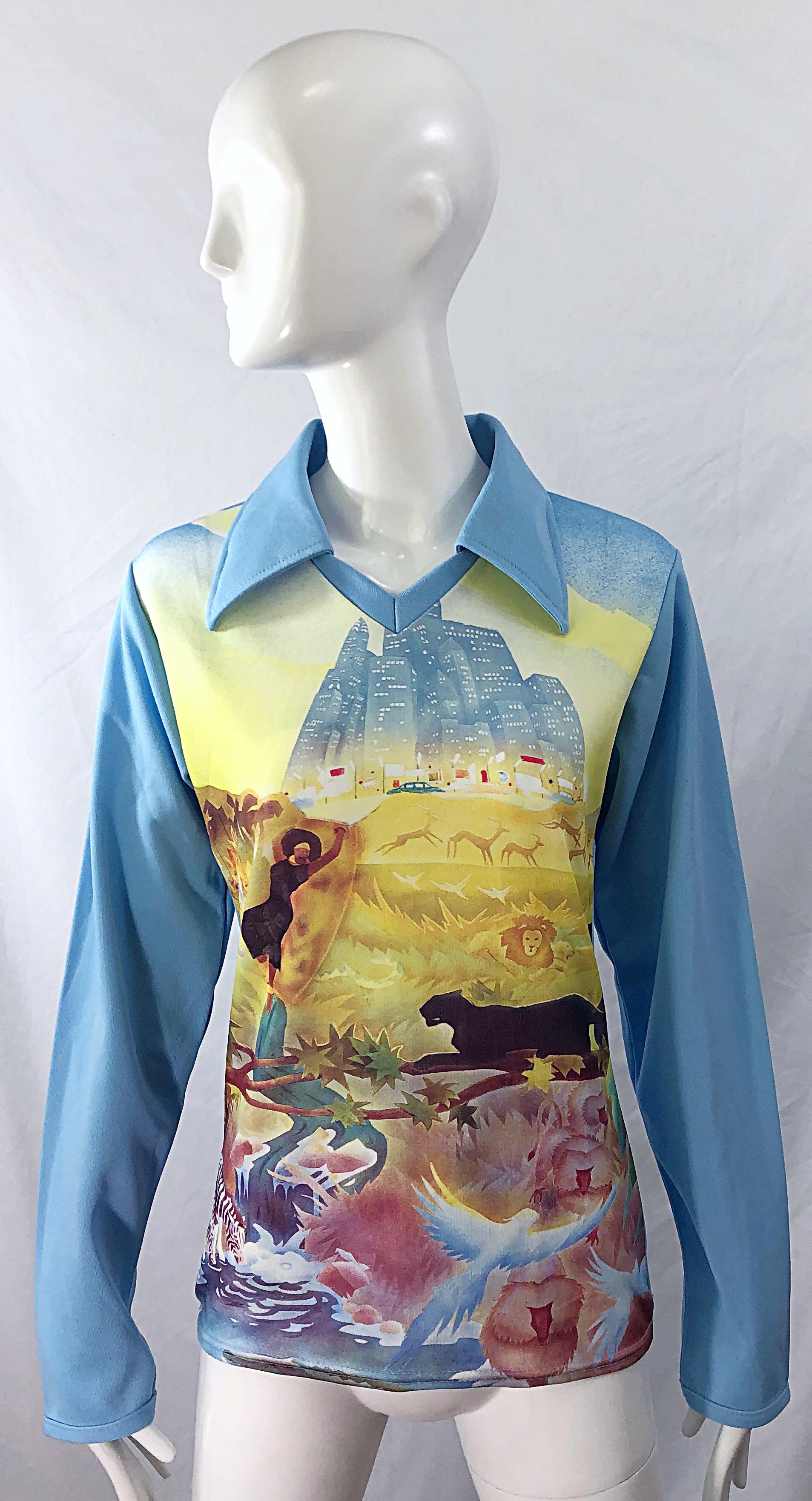 Awesome 1970s men’s 'Circle of Life' Tiger King novelty print log sleeve knit shirt ! Simply slips over the head and stretches to fit. 
In great condition
Made in USA
Approximatley Size Men's Small
Measurements: ( has some stretch )
36-38 inch