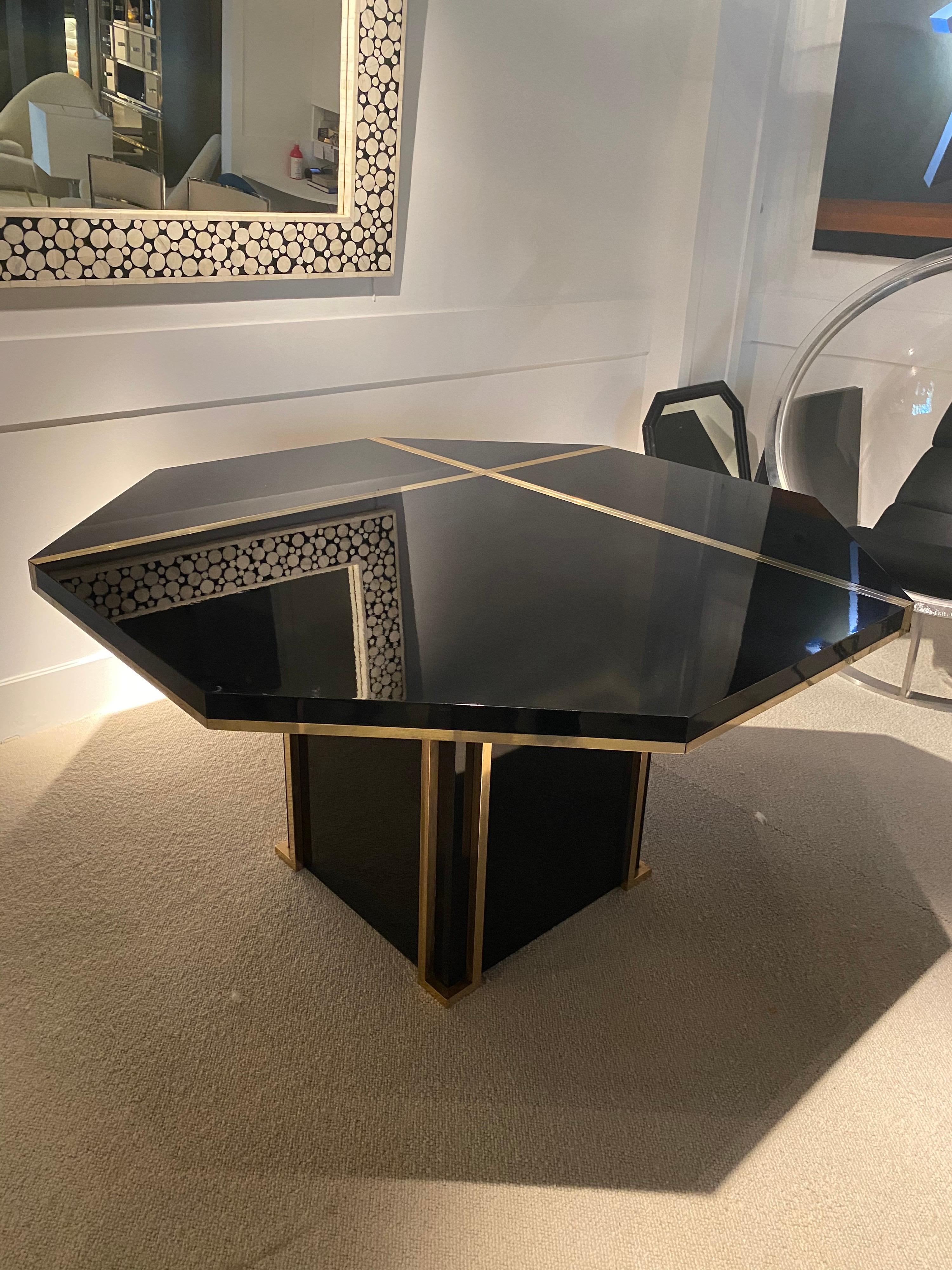 1970S Octogonal dining Table In Black Laquered And Brass Details
Vintage condition.