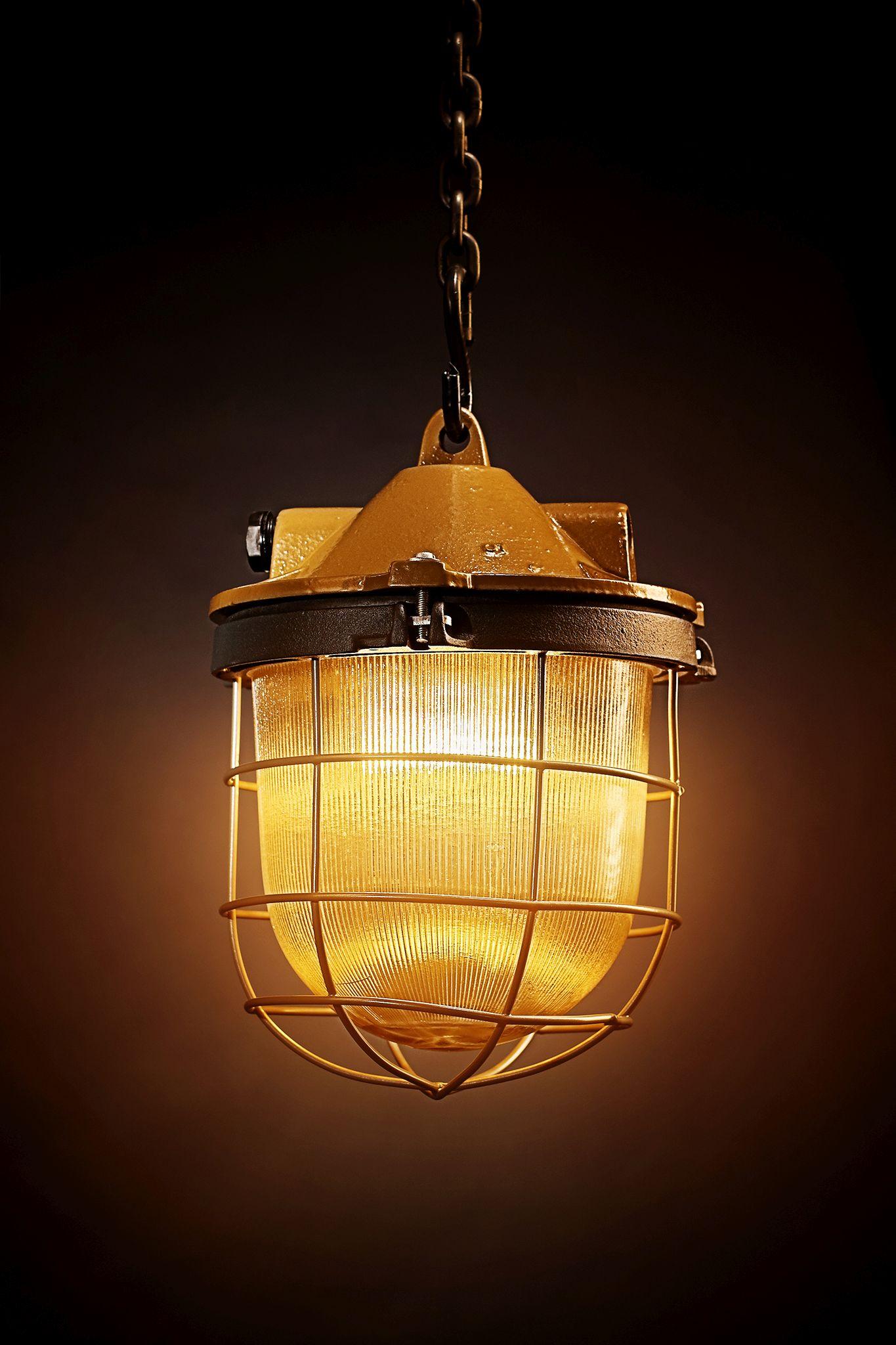 Primary use:
Hanging cast iron lamp OKS-1 used to illuminate factory and workshop spaces, where there was dustiness and a chance for a mechanical damage.
Manufacturer: Lighting Equipment Factory ZAOS in Wilkasy near Gizycko
Time period: